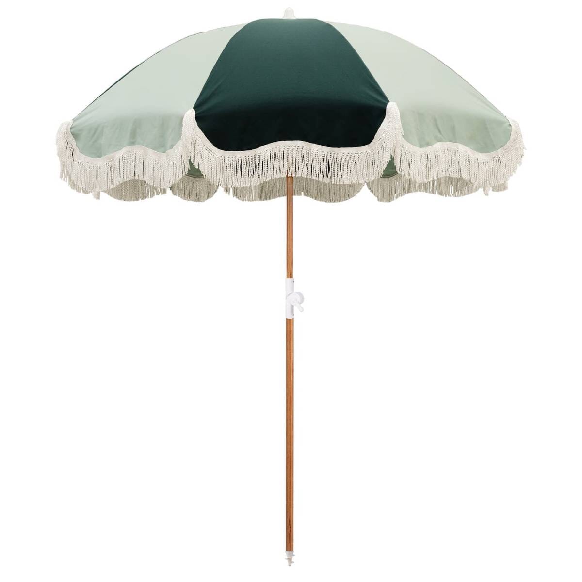 studio image of 70s panel green holiday beach umbrella
