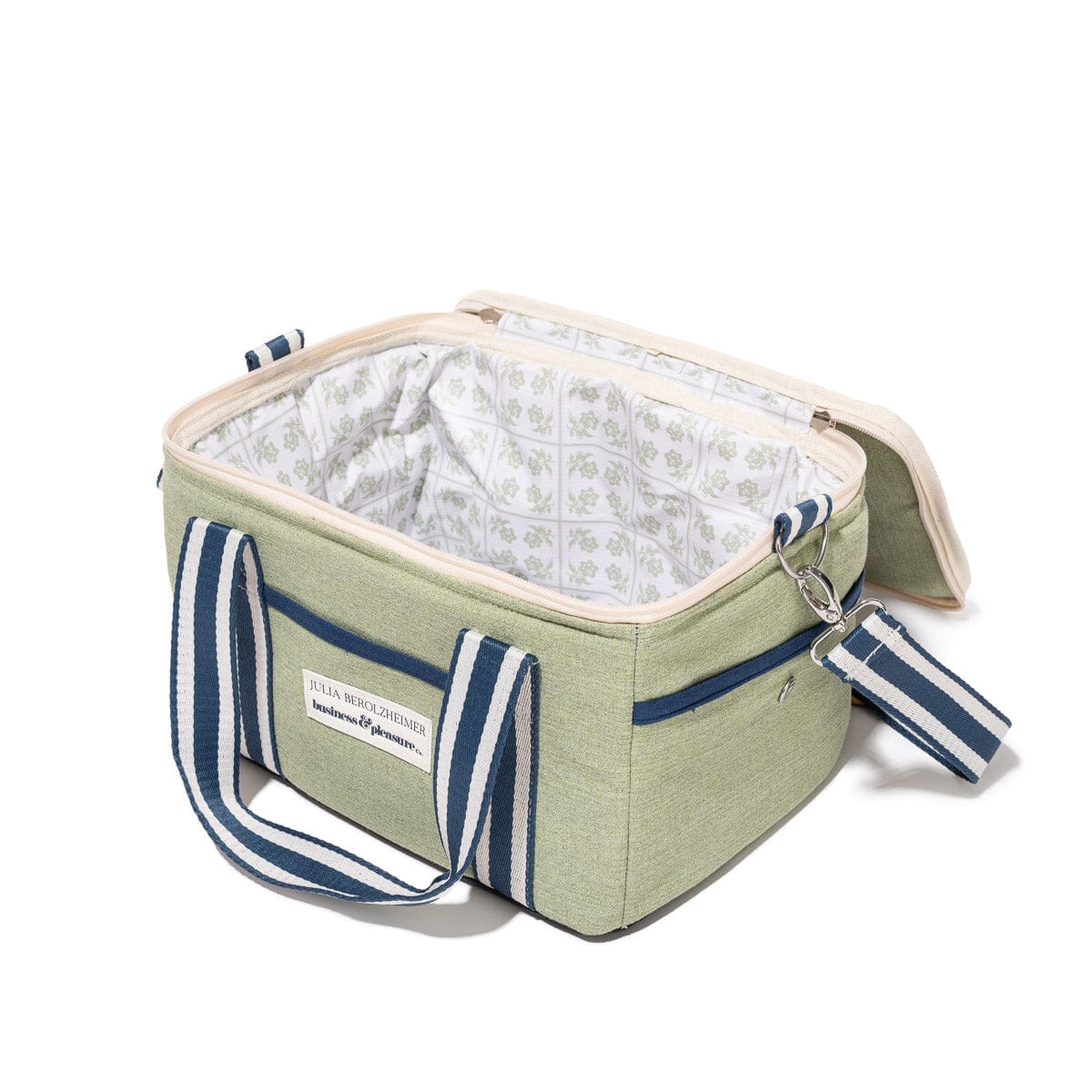 Green and blue striped cooler bag with a patterned interior on a white background