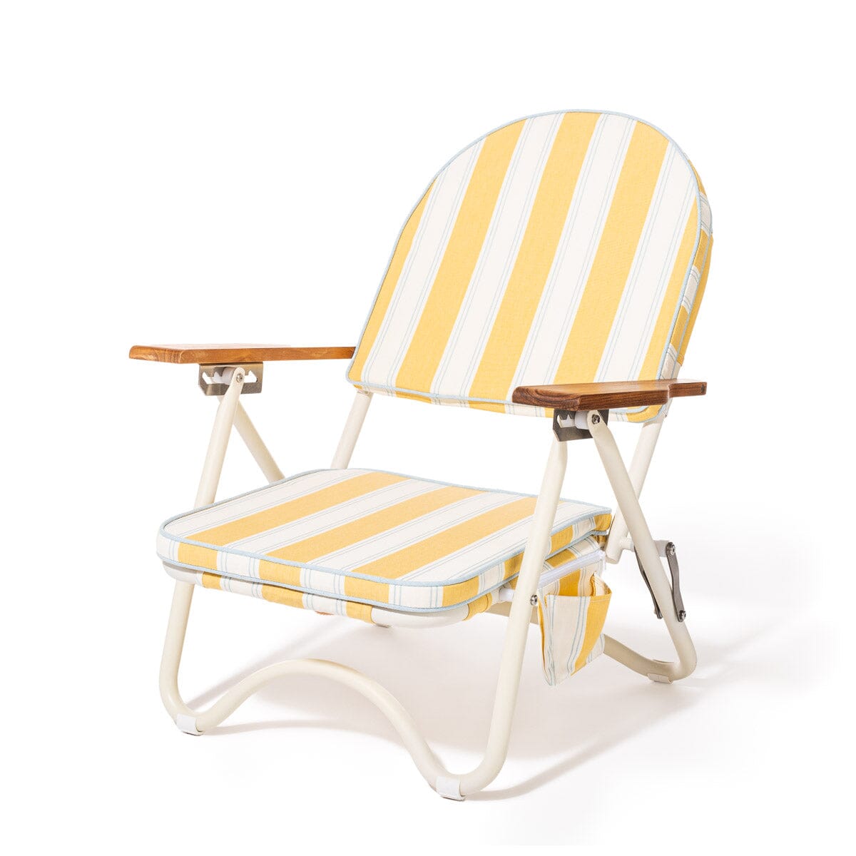 Yellow and white striped folding chair on a white background