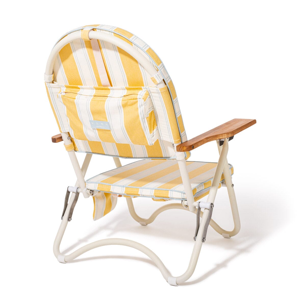 Yellow and white striped folding chair with wooden armrest on a white background