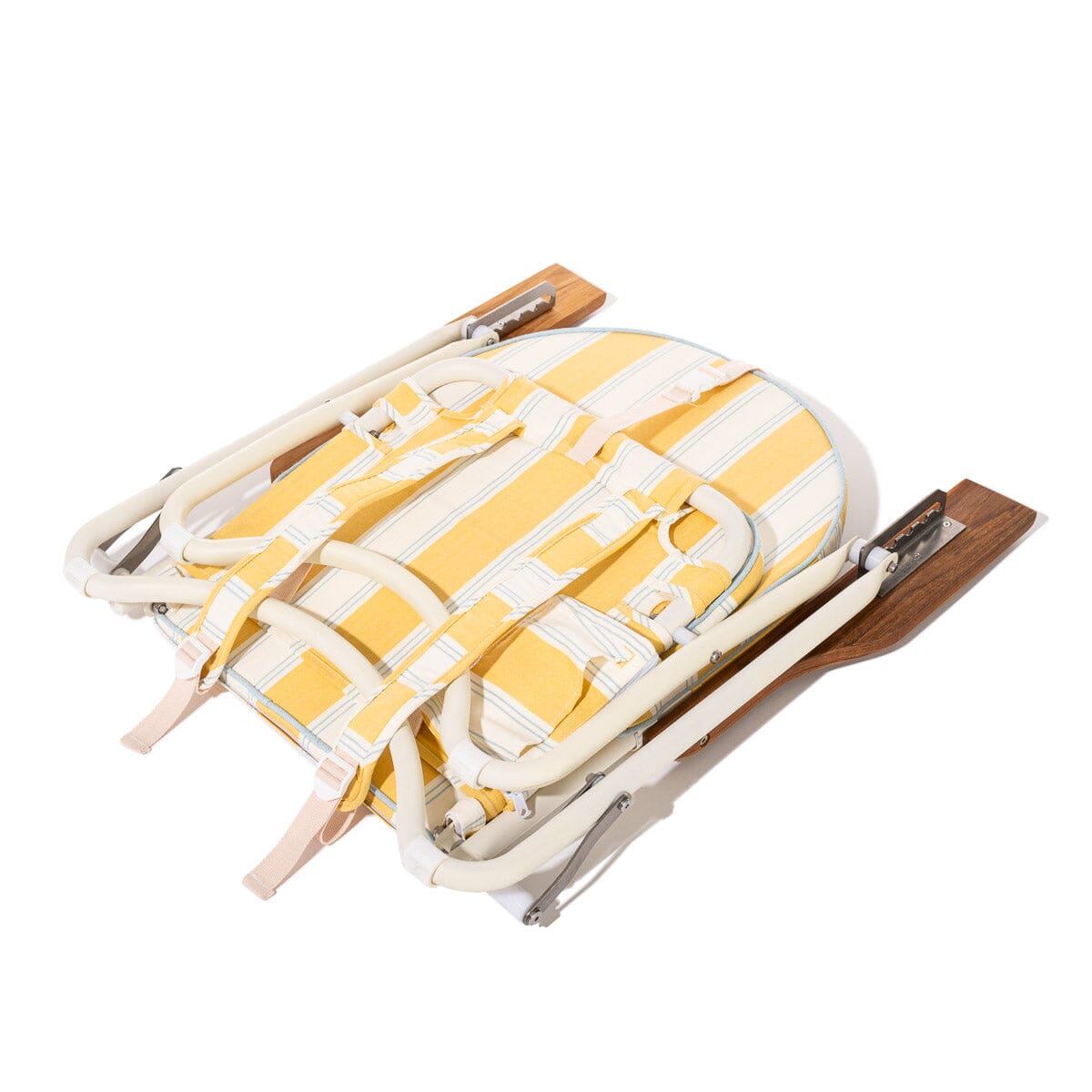 Yellow and white striped bag with wooden accents on a white background