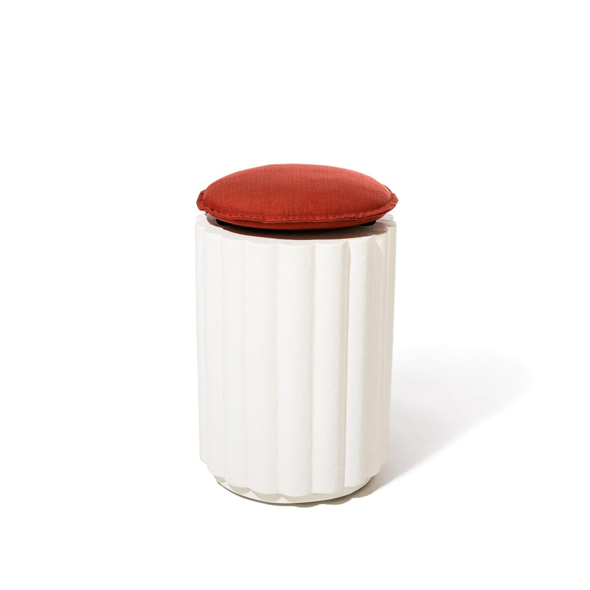 White cylindrical Side Table with a red cushion on a white background