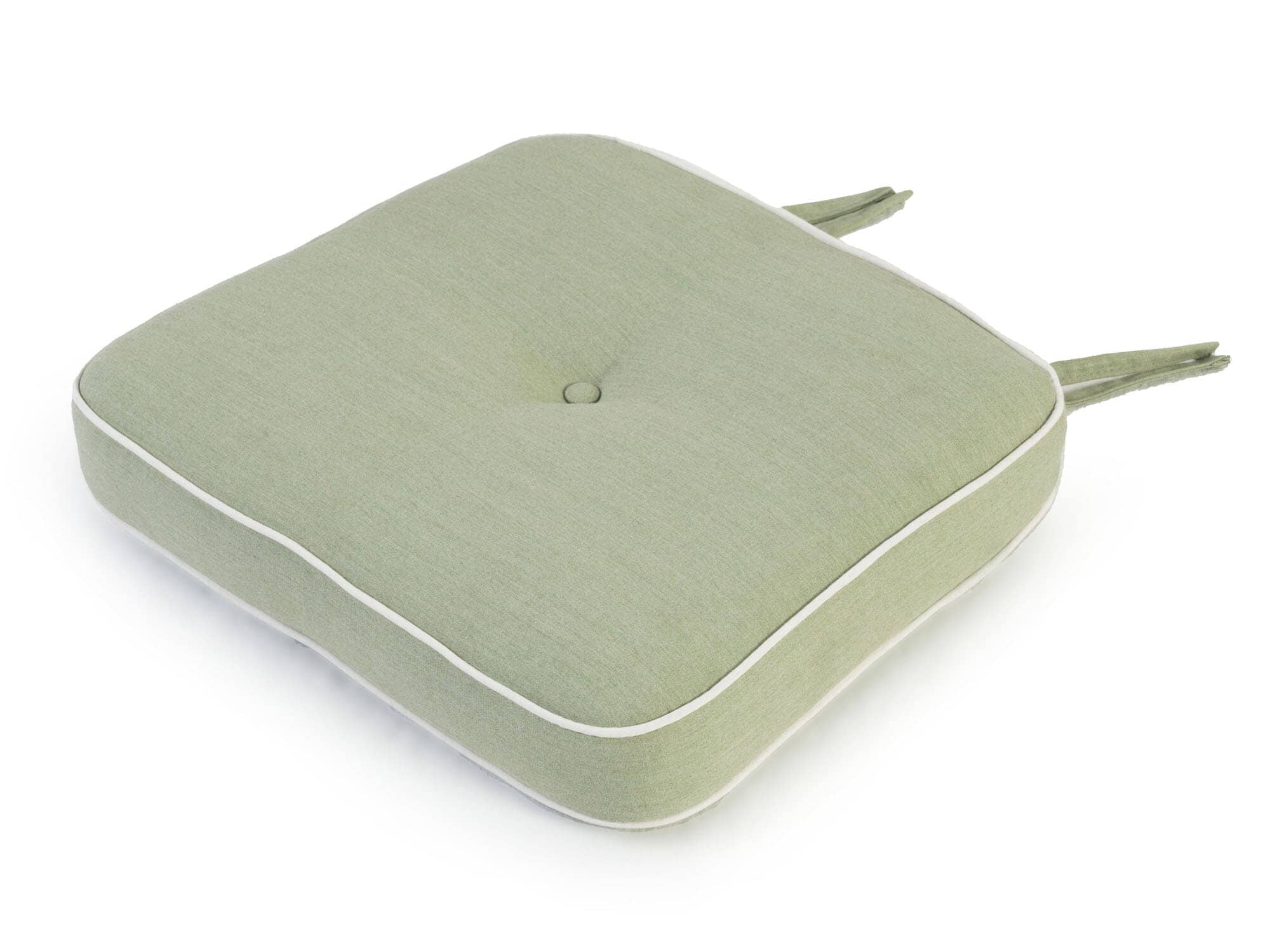 green chair cushion on white backdrop