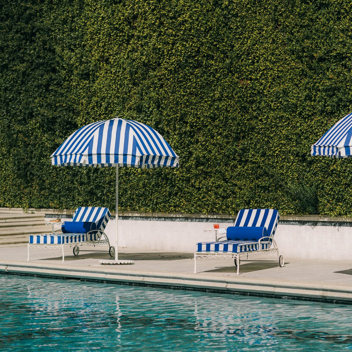 The Al Fresco Sun Lounger in Crew Mediterranean Blue Stripe | Antique White Frame Bundle Business & Pleasure Co.