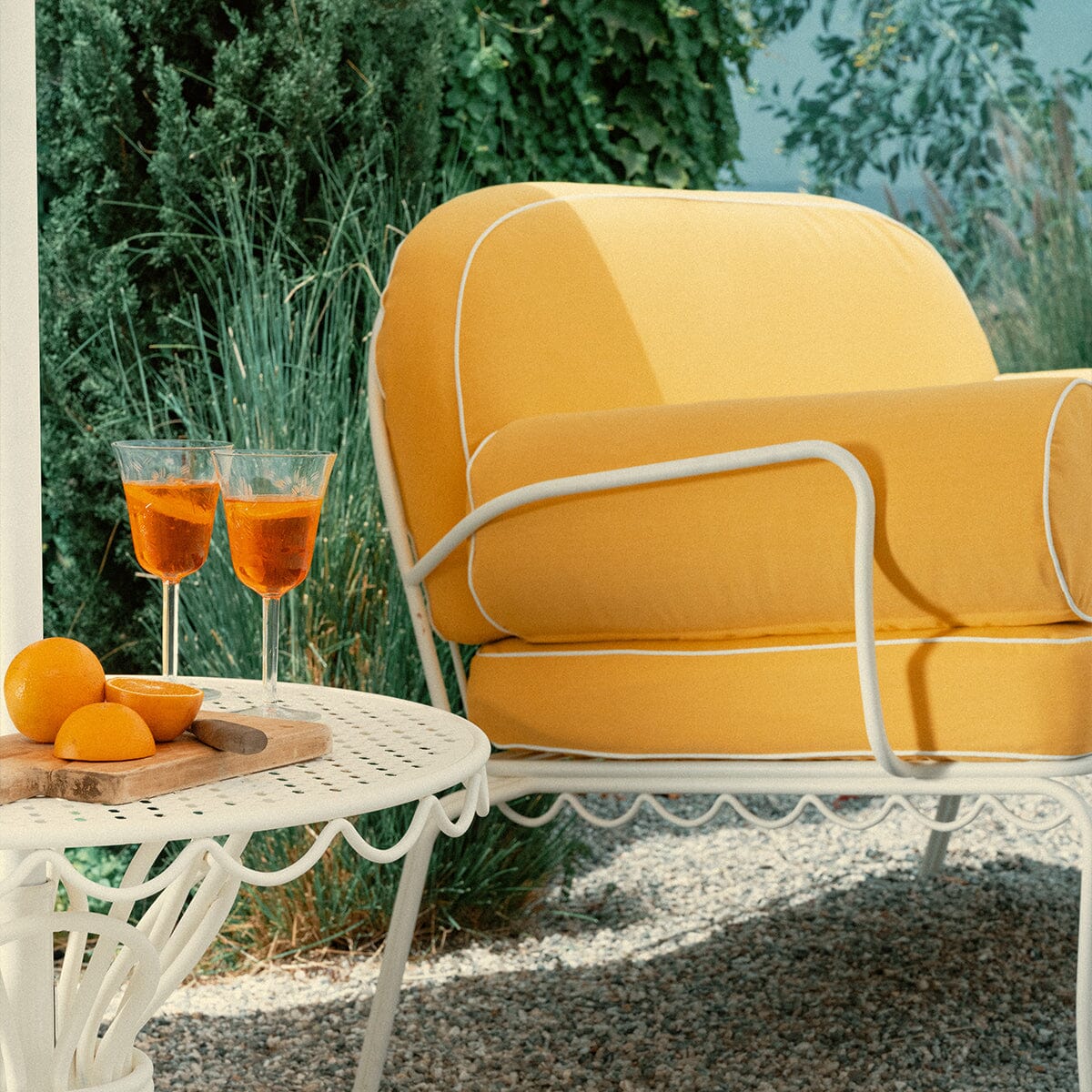 The Al Fresco Love Seat in Rivie Mimosa | Antique White Frame Bundle Business & Pleasure Co.