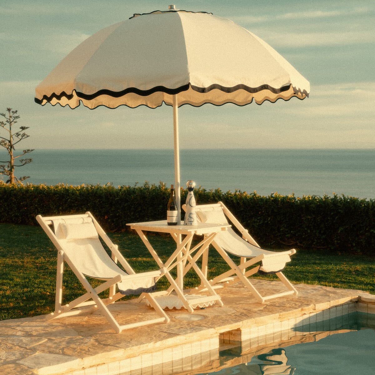 The Patio Umbrella - Rivie White Patio Umbrella Business & Pleasure Co. 