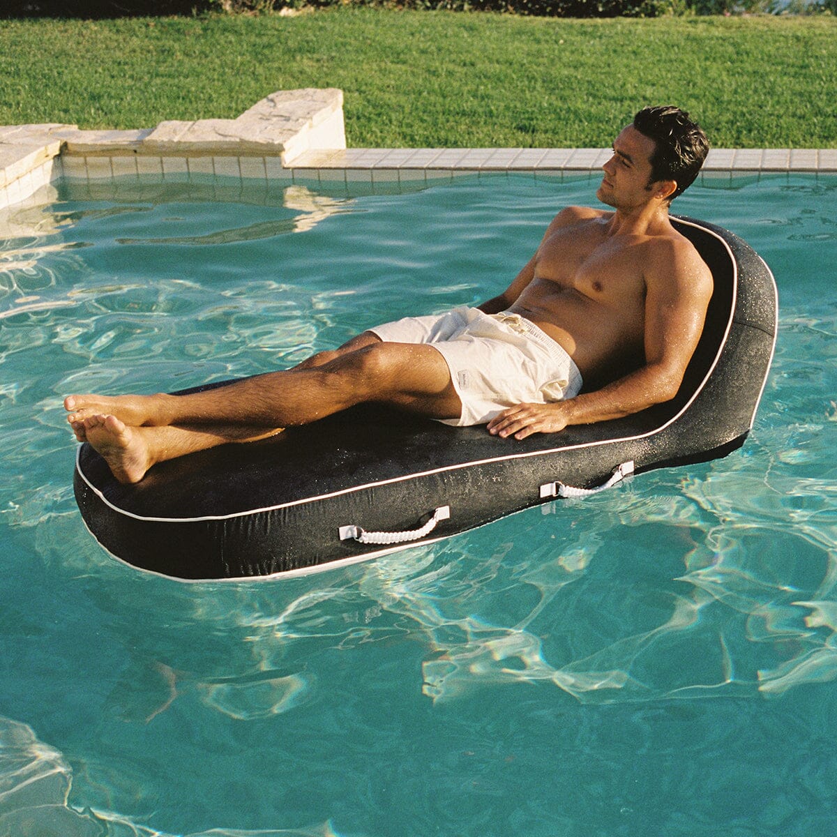 The Pool Lounger - Rivie Black Pool Lounger Business & Pleasure Co.