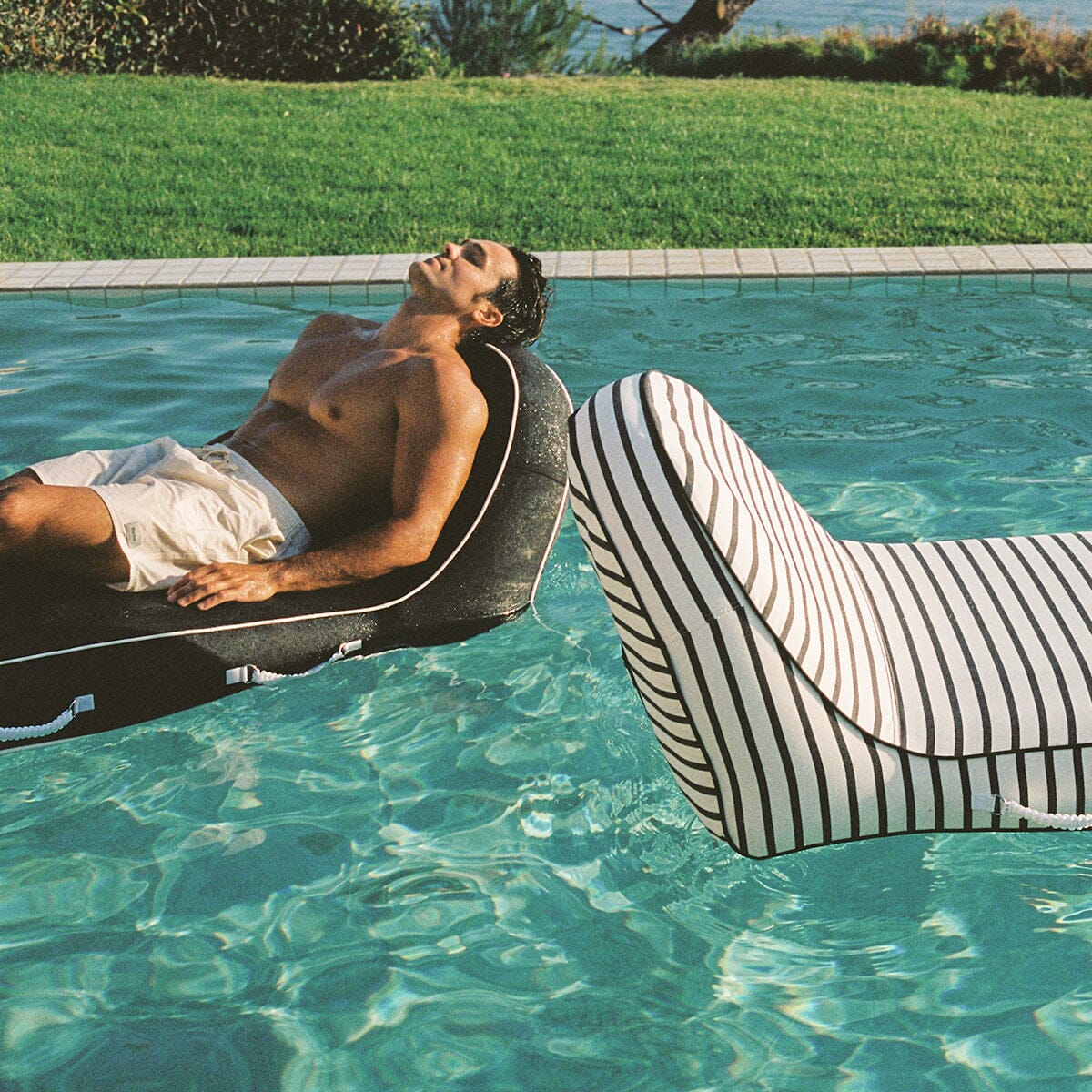 The Pool Lounger - Rivie Black Pool Lounger Business & Pleasure Co.