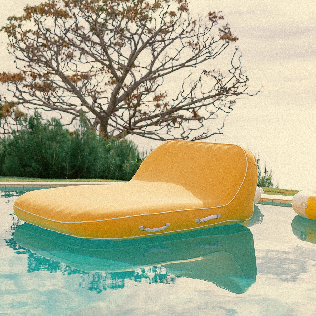 The XL Pool Lounger - Rivie Mimosa Pool Lounger Business & Pleasure Co
