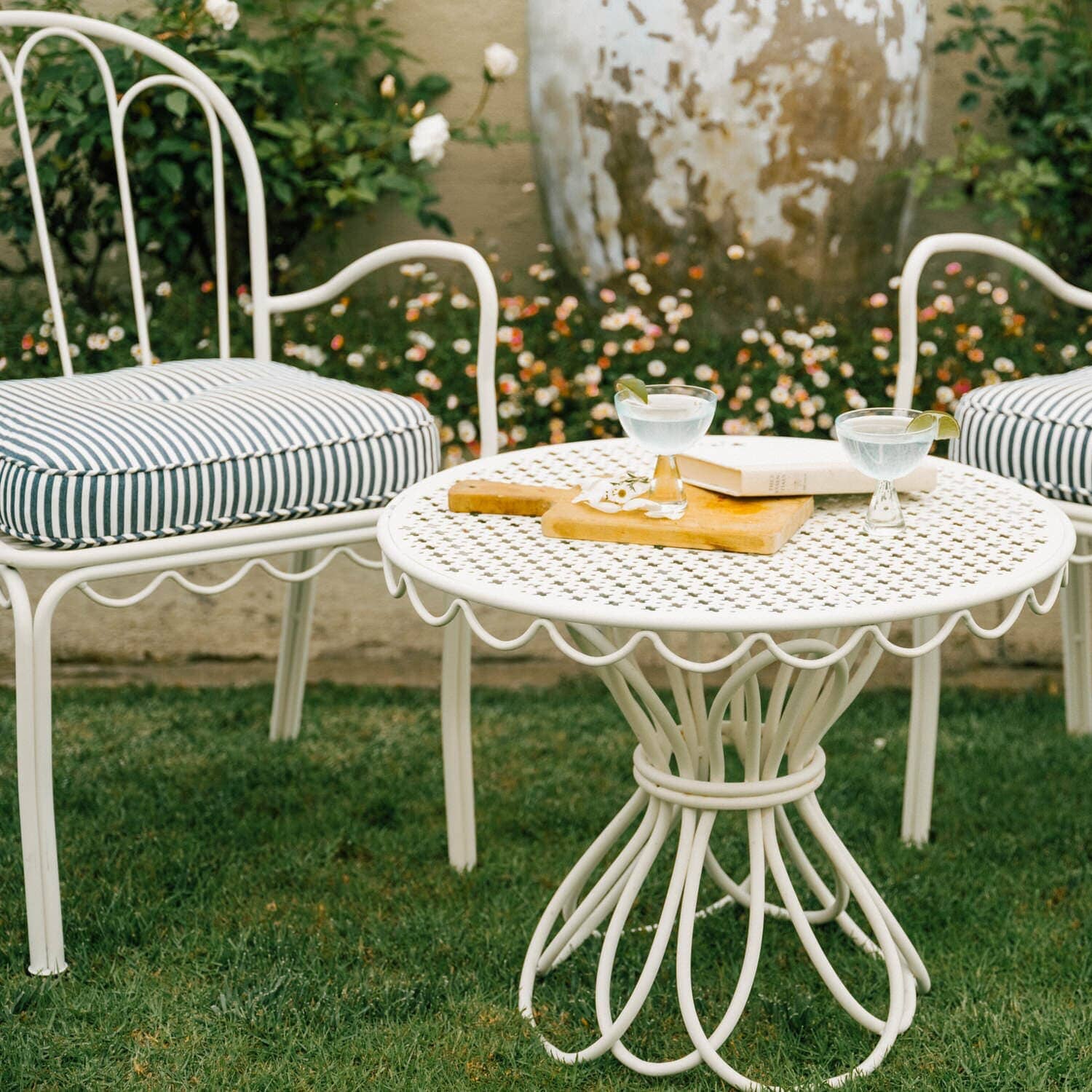 Navy al fresco chairs in a garden