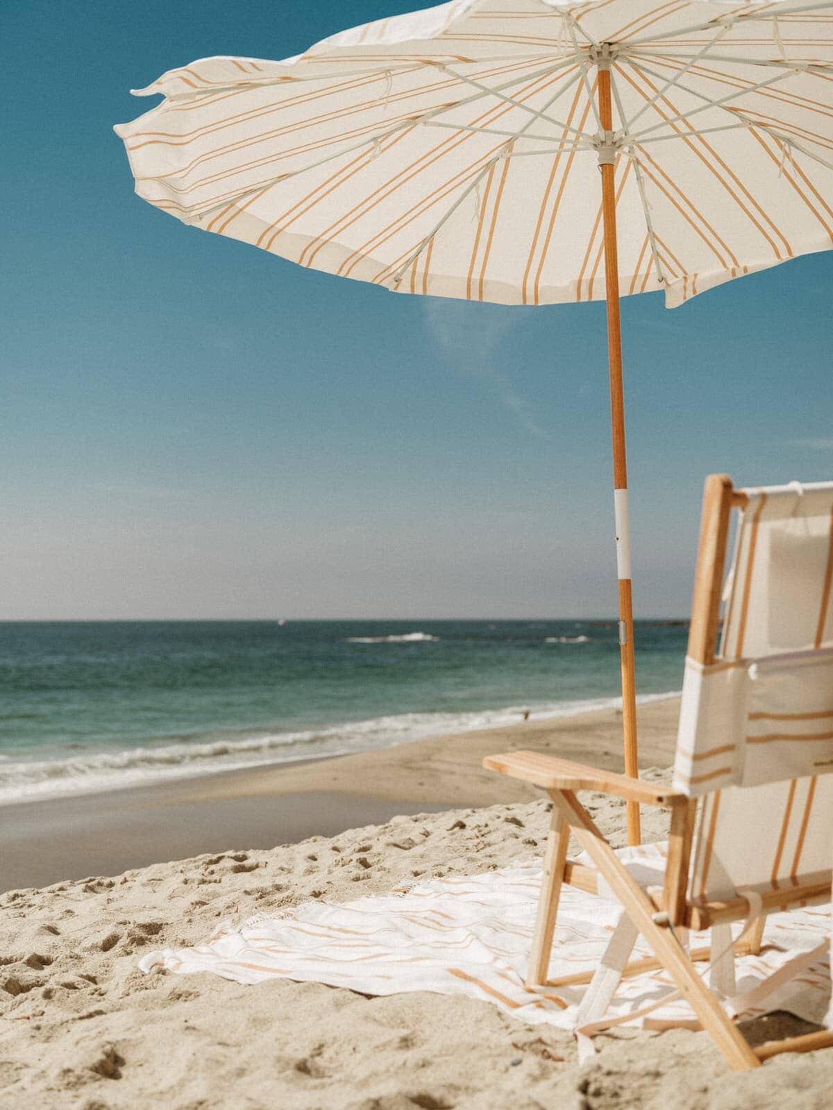 Sand two stripe amalfi and tommy chair on the beach