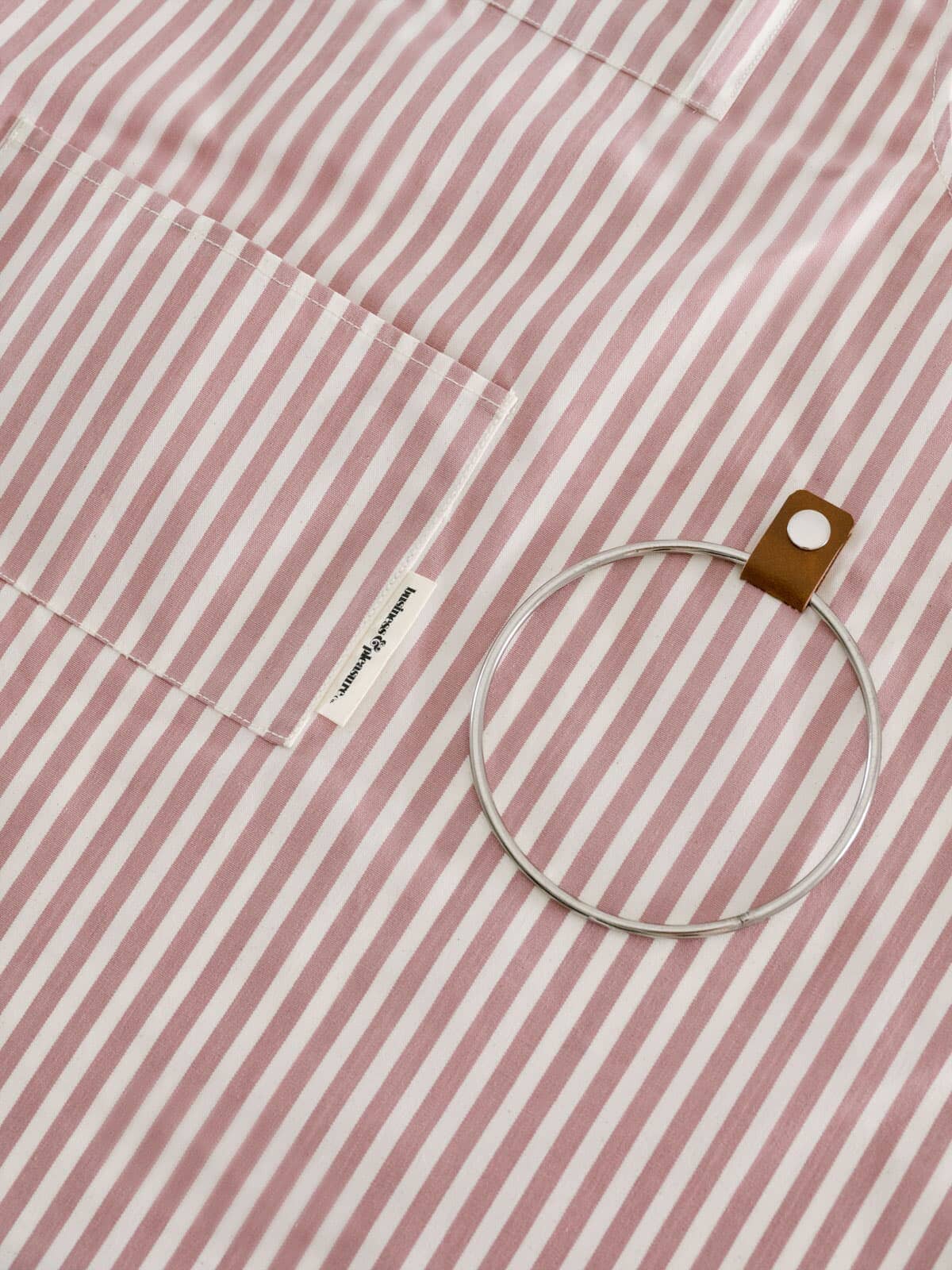Studio image of pink apron