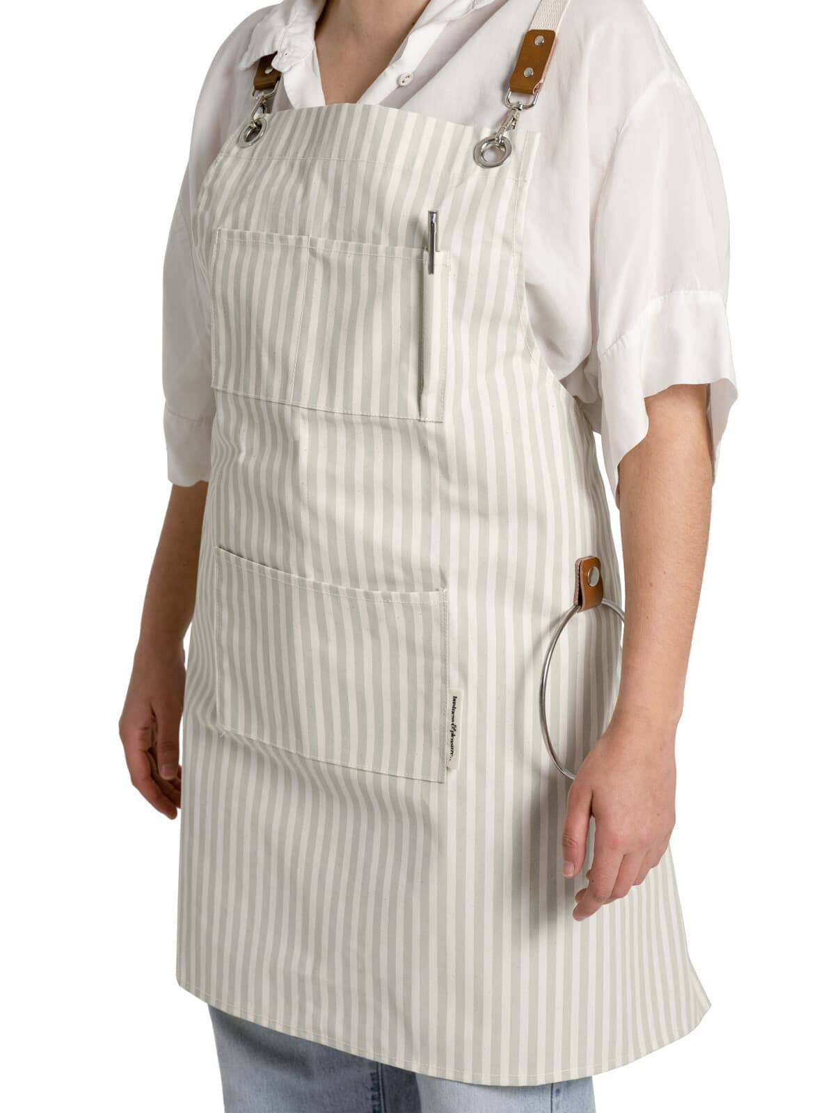 Studio image of sage apron on model