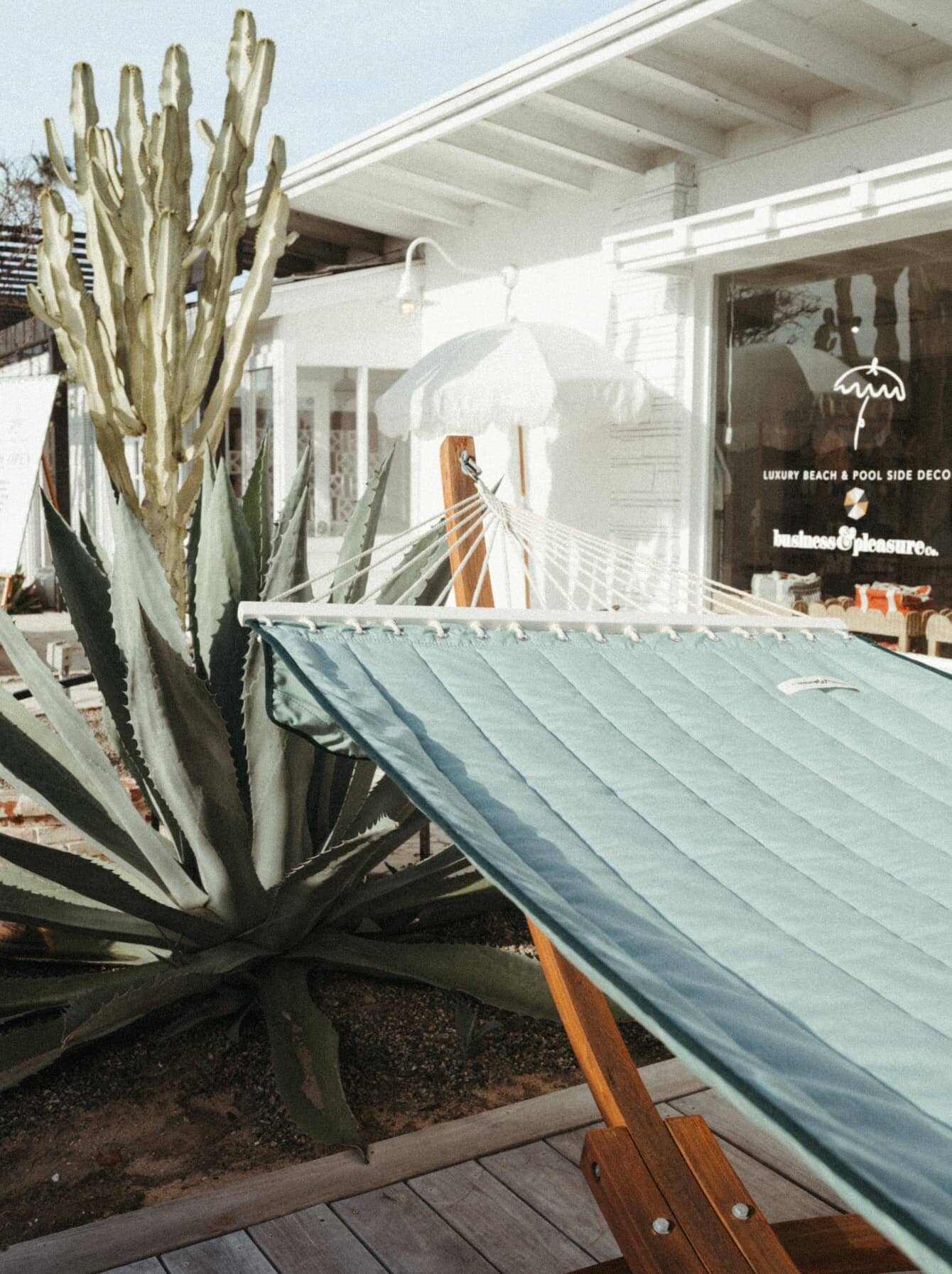 riviera green hammock on a patio