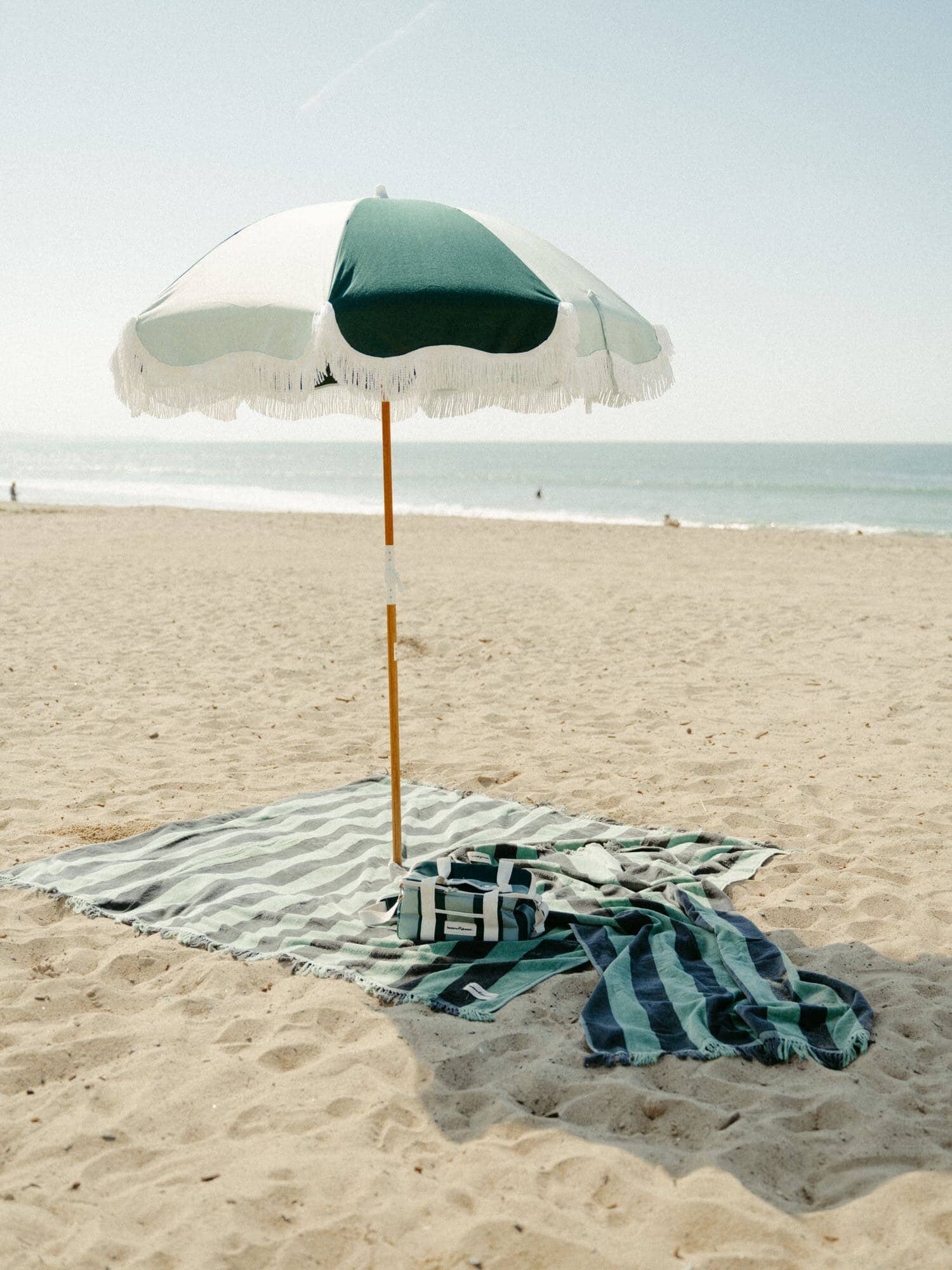 70s panel green cooler and towel on the beach