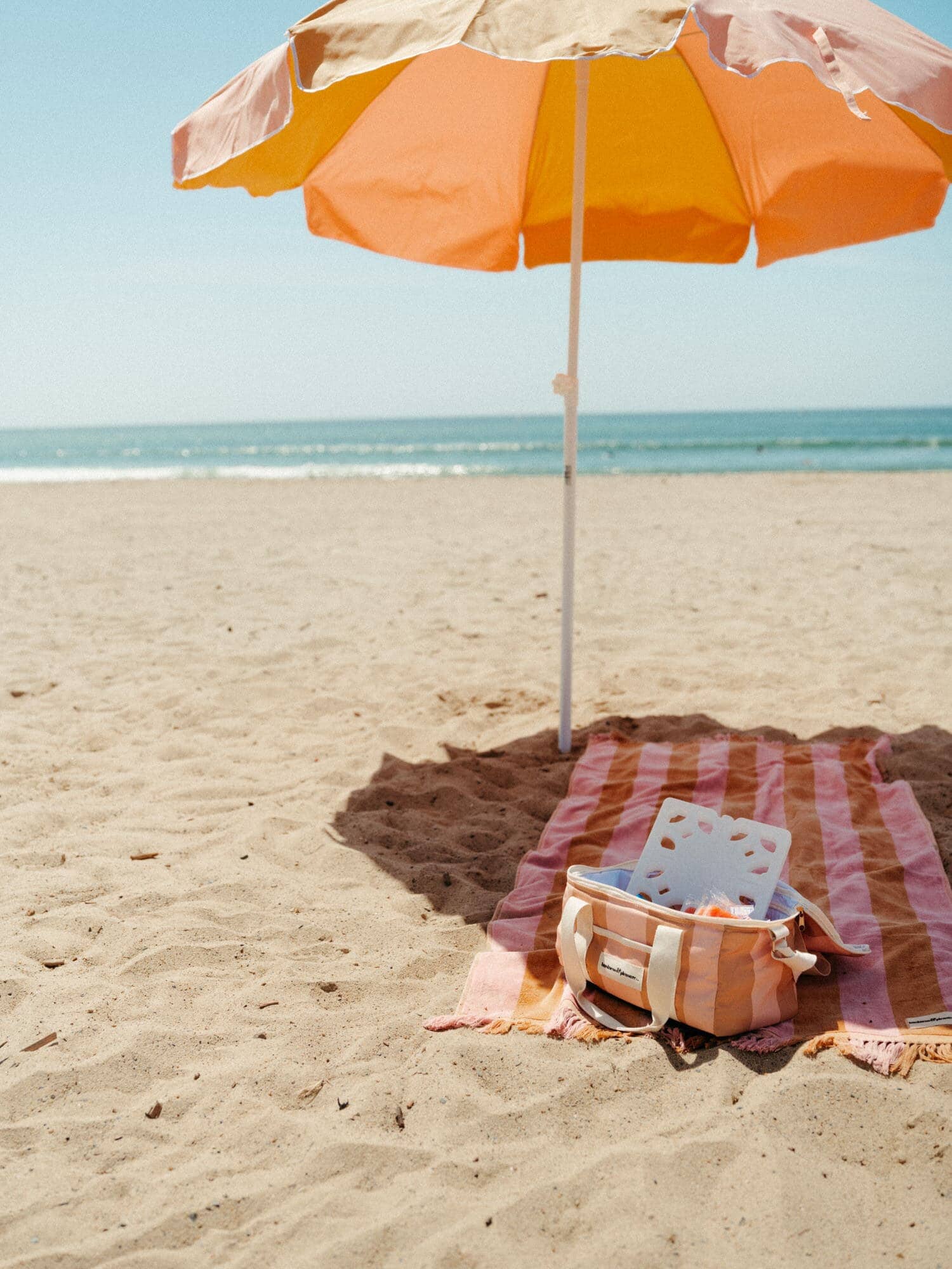 70s panel sand cooler and towel on the beach