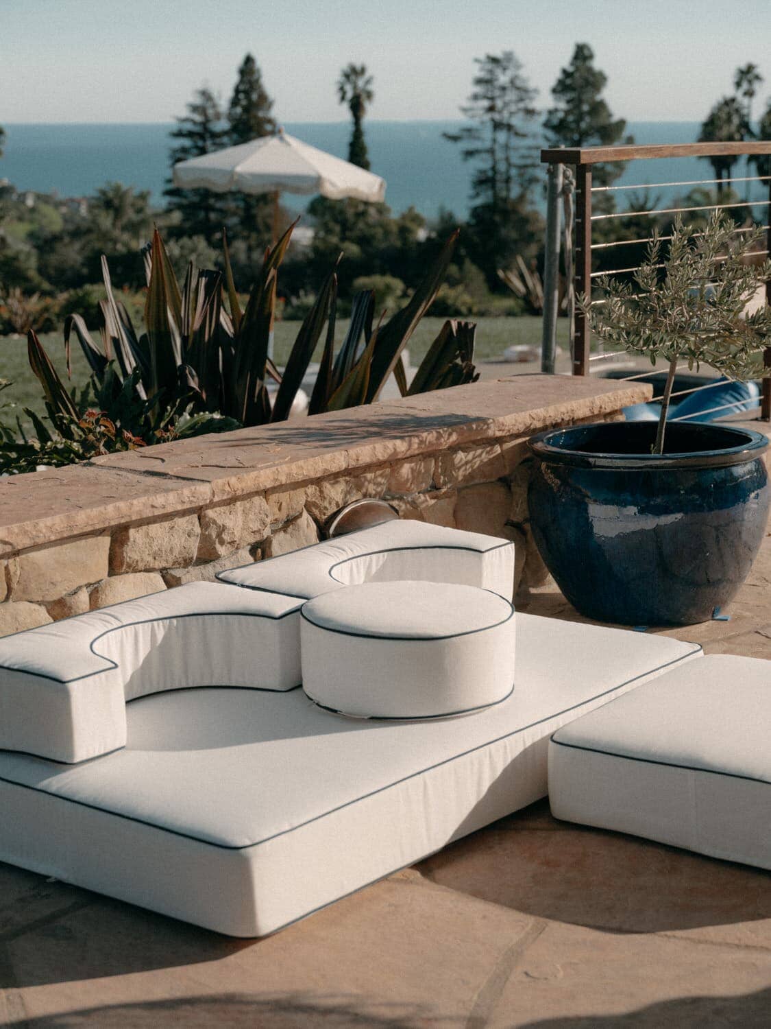 white modular cushion on a patio