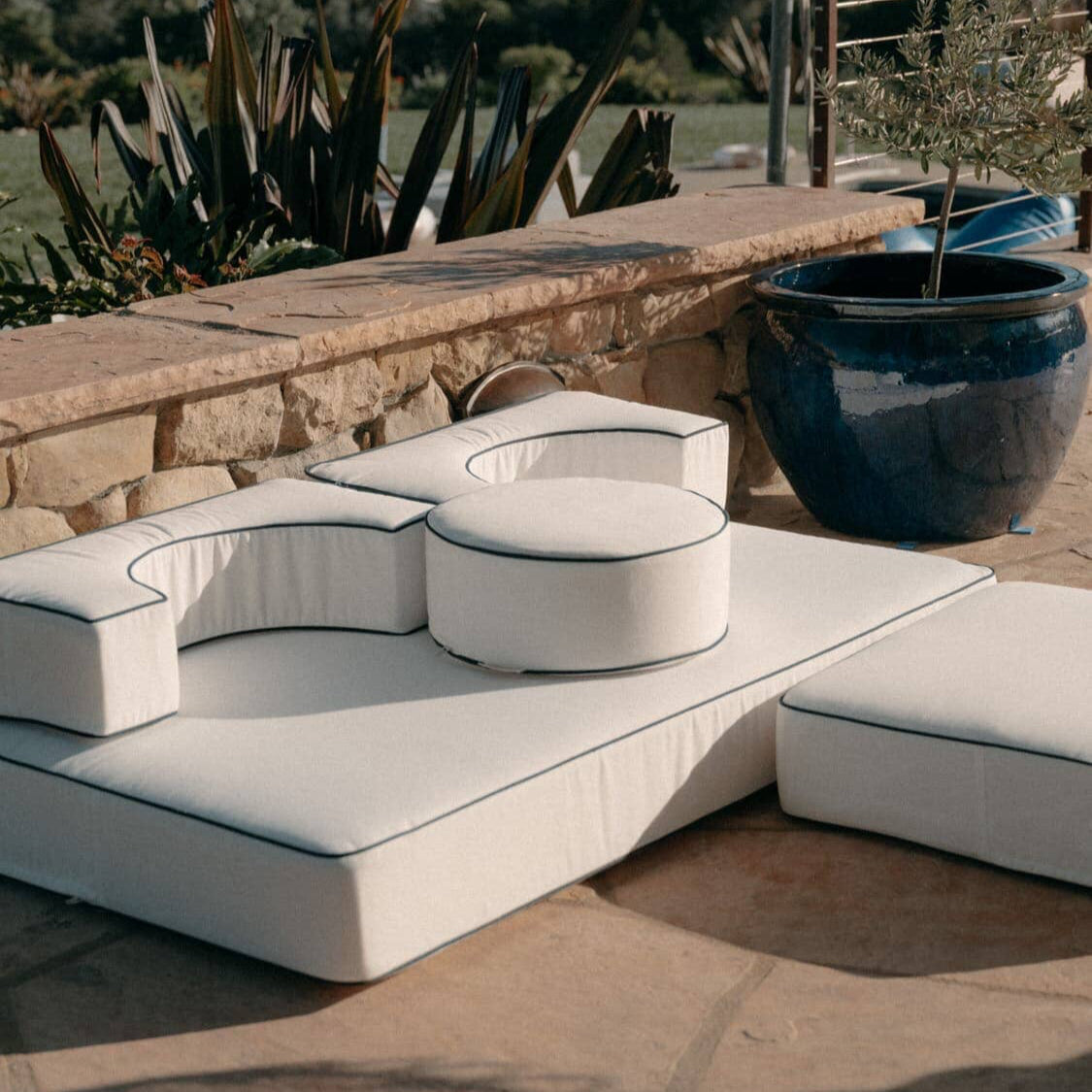 white modular cushion on a patio