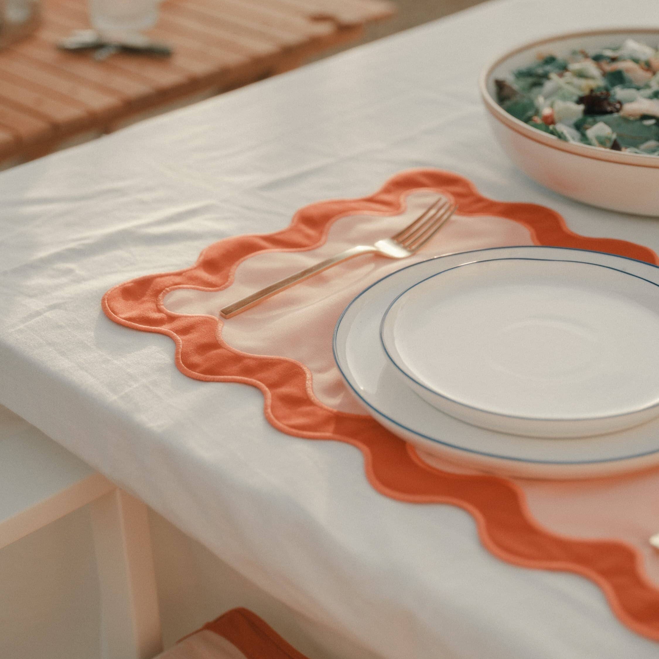 table setting with table cloth and placemat