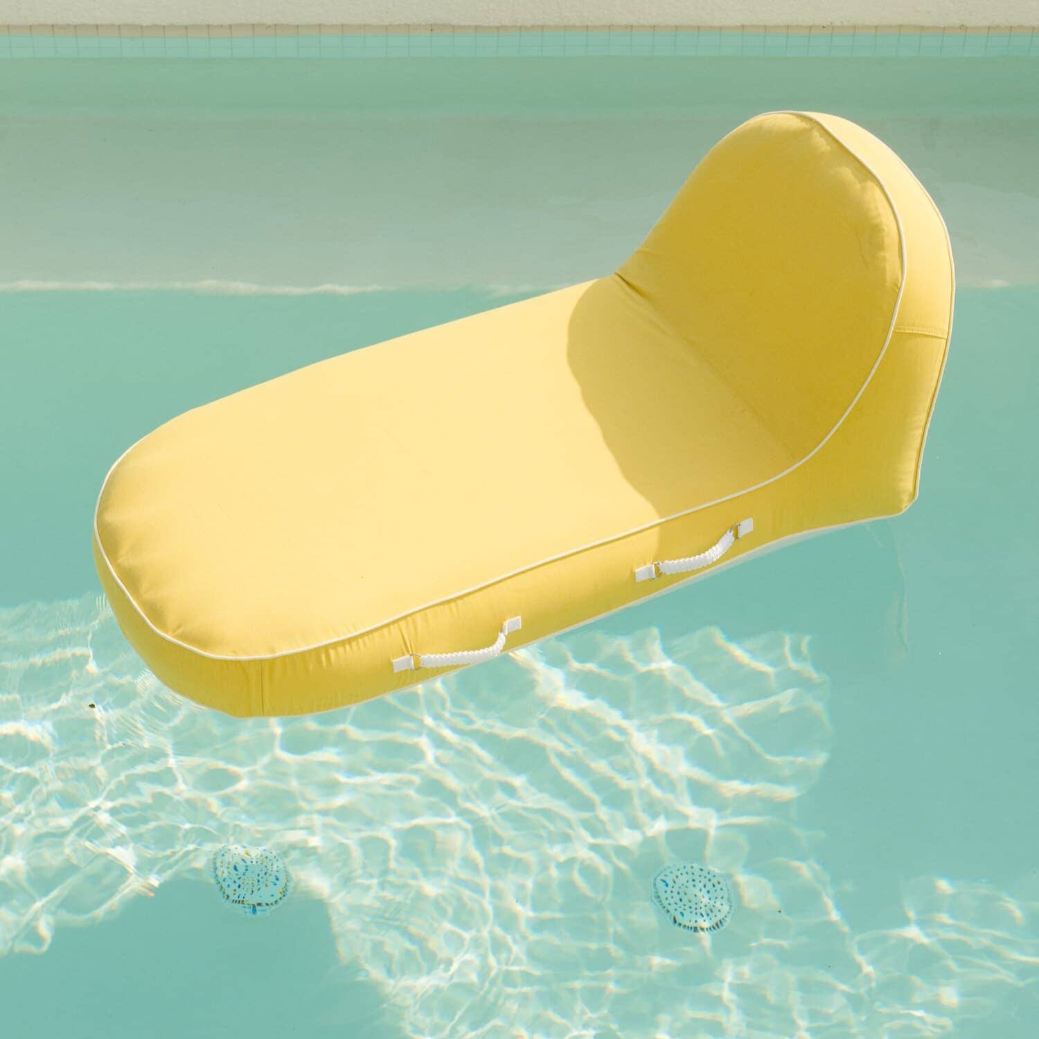 Riviera mimosa pool lounger in the pool