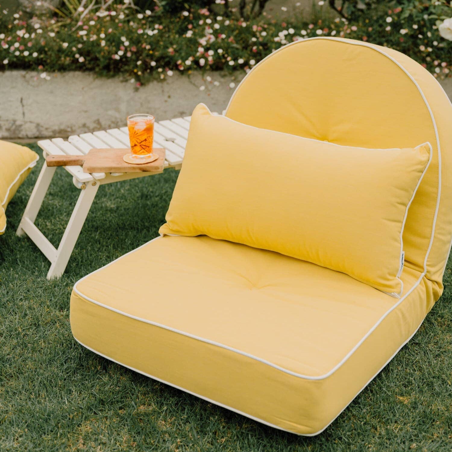 Riviera mimosa lounger in a garden setting
