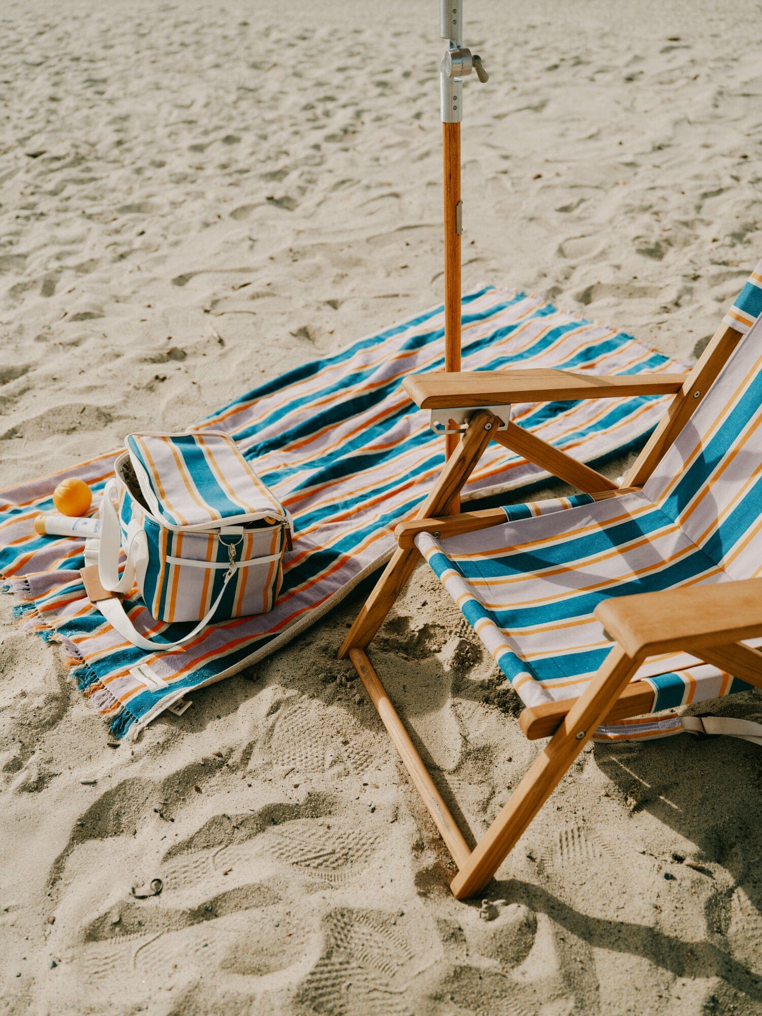 Beach set up with Smallable umbrella, chair and accessories