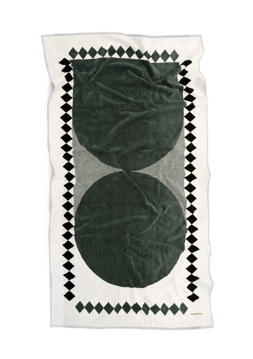 Studio image of front of diamond green beach towel