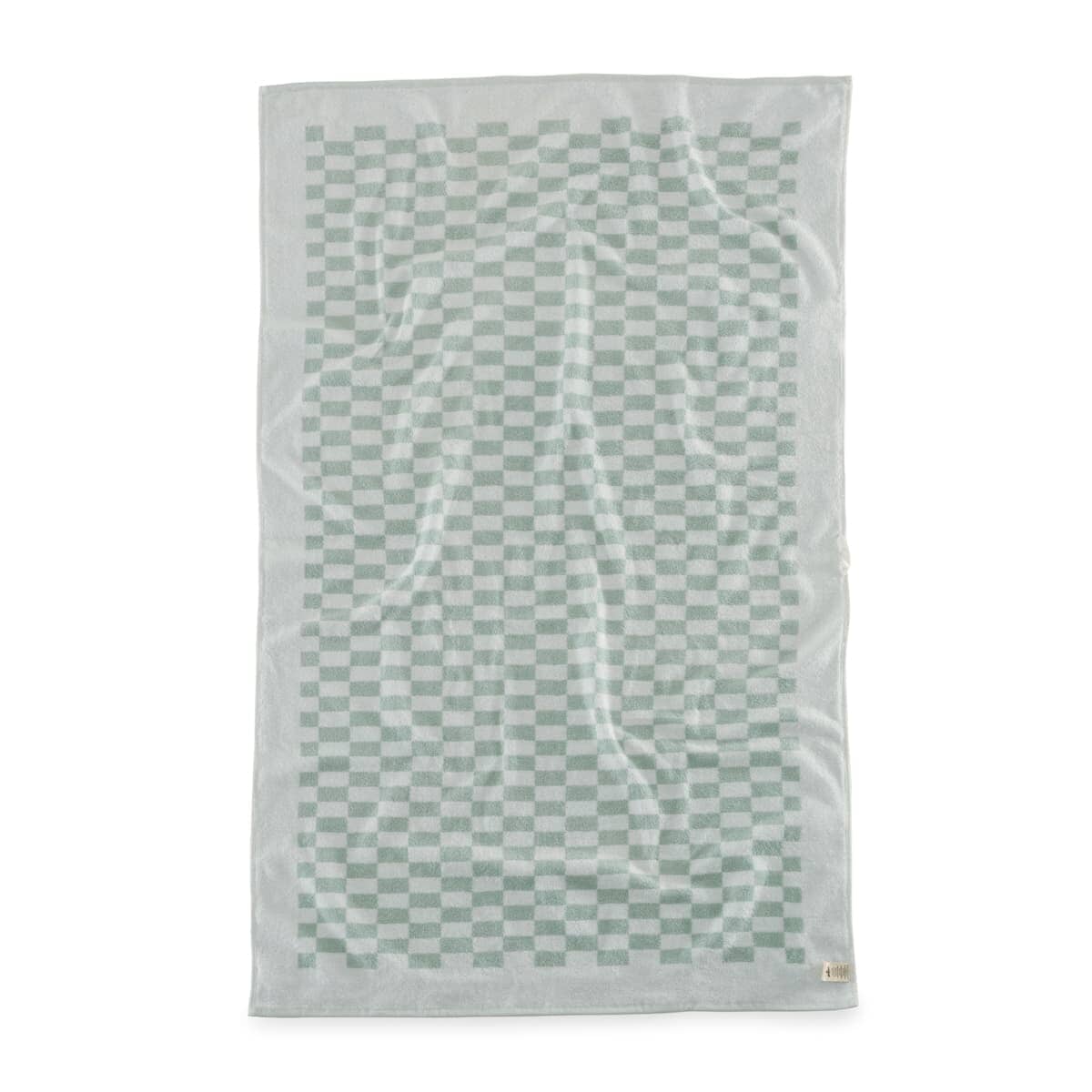 Studio image of light green checker towel