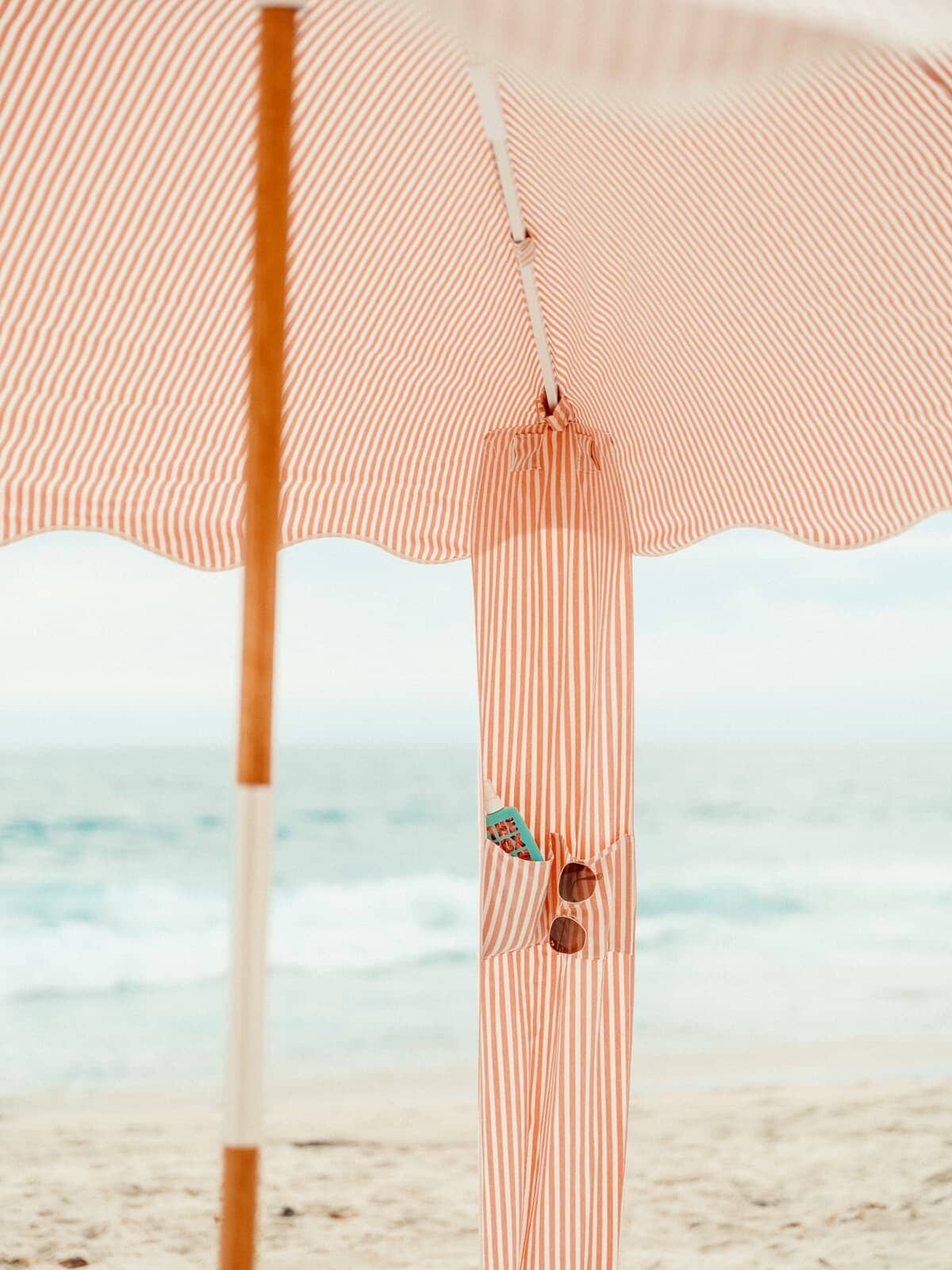 Cabana arm with sunscreen and sunglasses