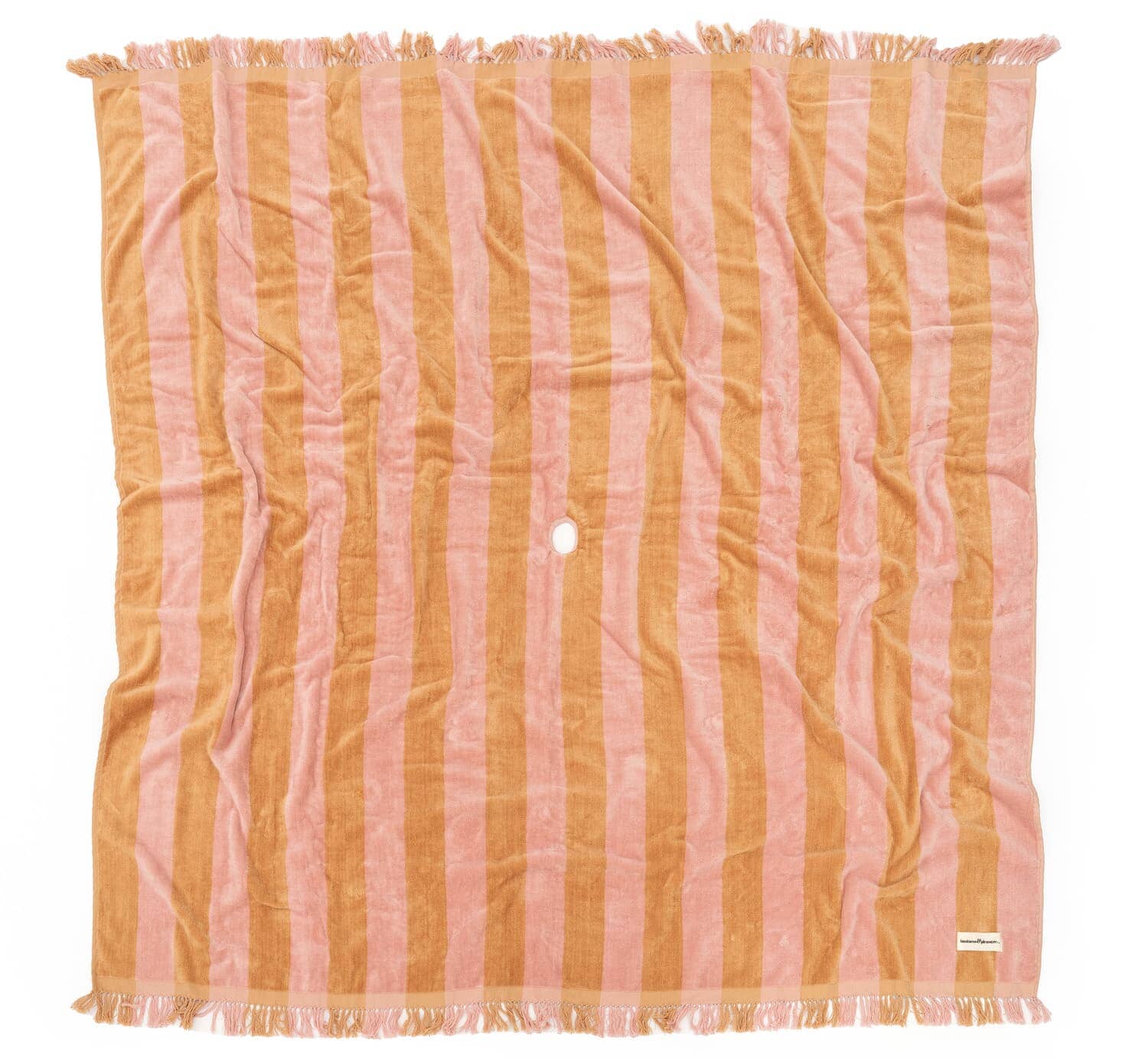 studio image of 70s sand and pink holiday blanket