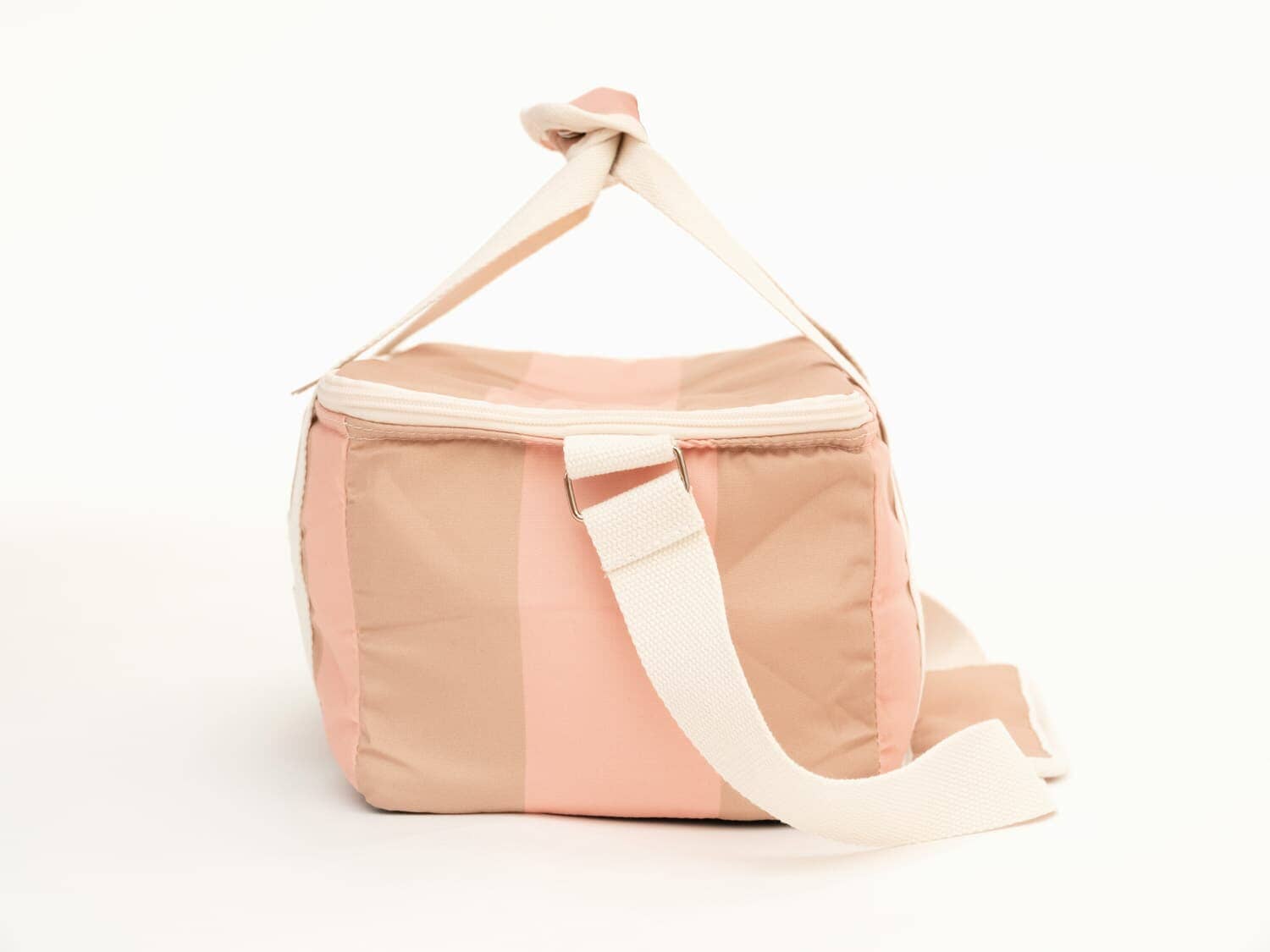 studio image of side view of 70s sand and pink holiday cooler bag