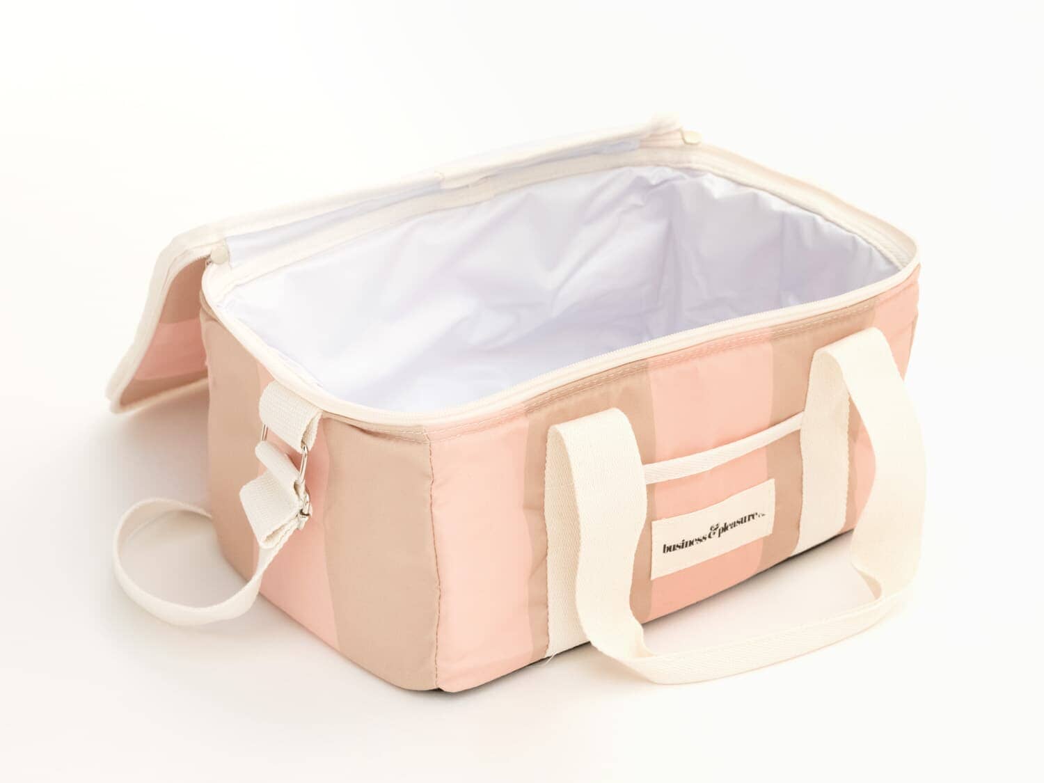 studio image of 70s sand and pink holiday cooler bag interior