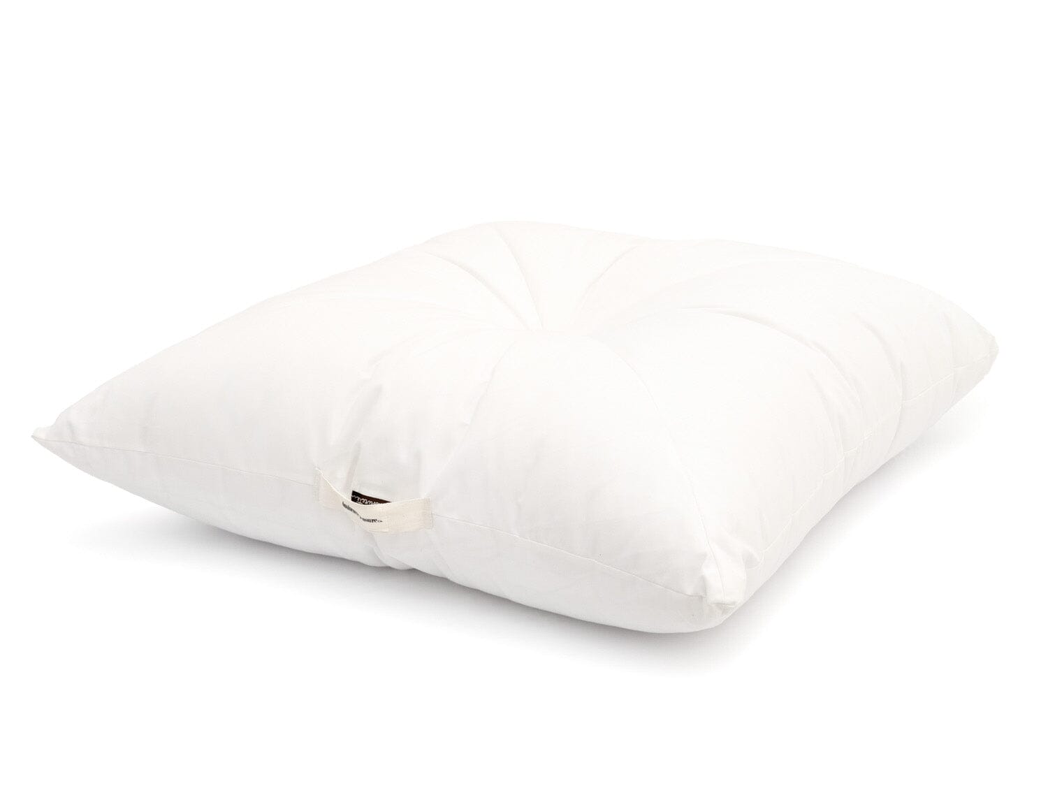angled image of white floor pillow
