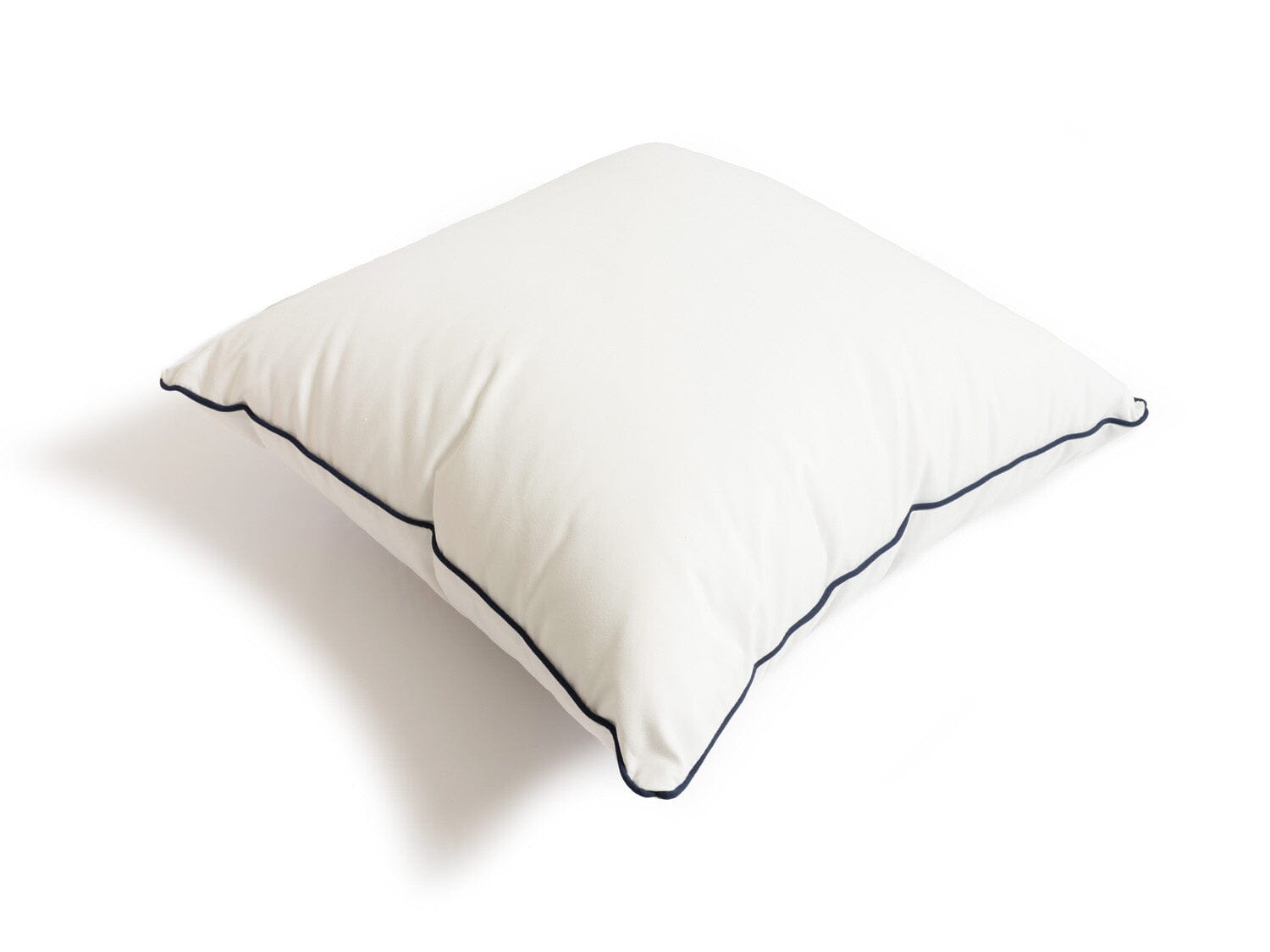 studio image of small white throw pillow