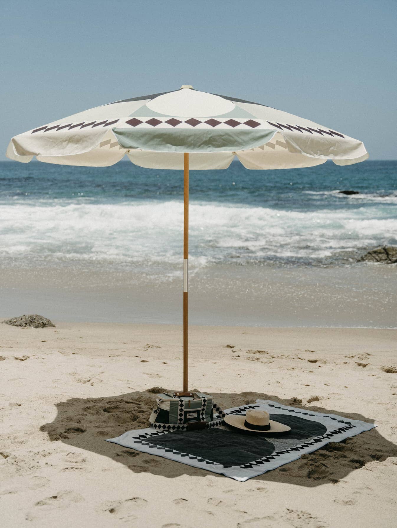 Diamond Green Amalfi Umbrella on the beach