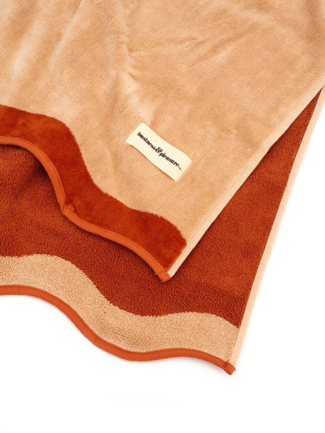 Studio image of riviera pink beach towel.