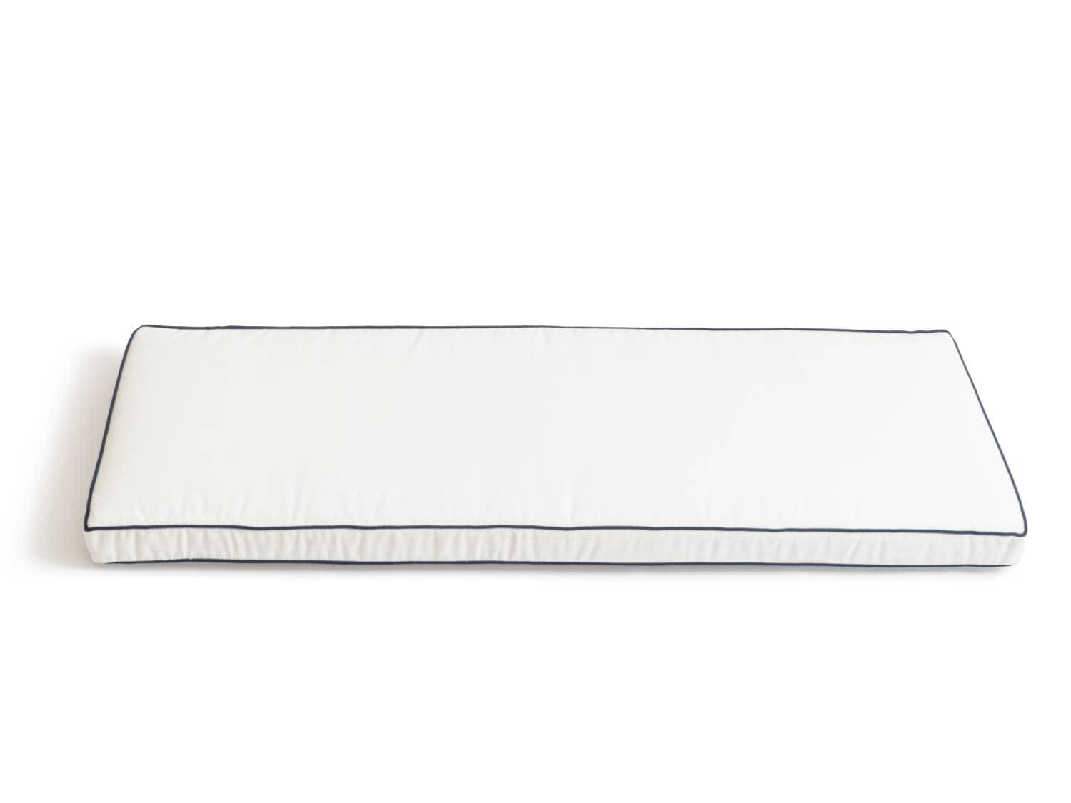 studio image of antique white bench pillow