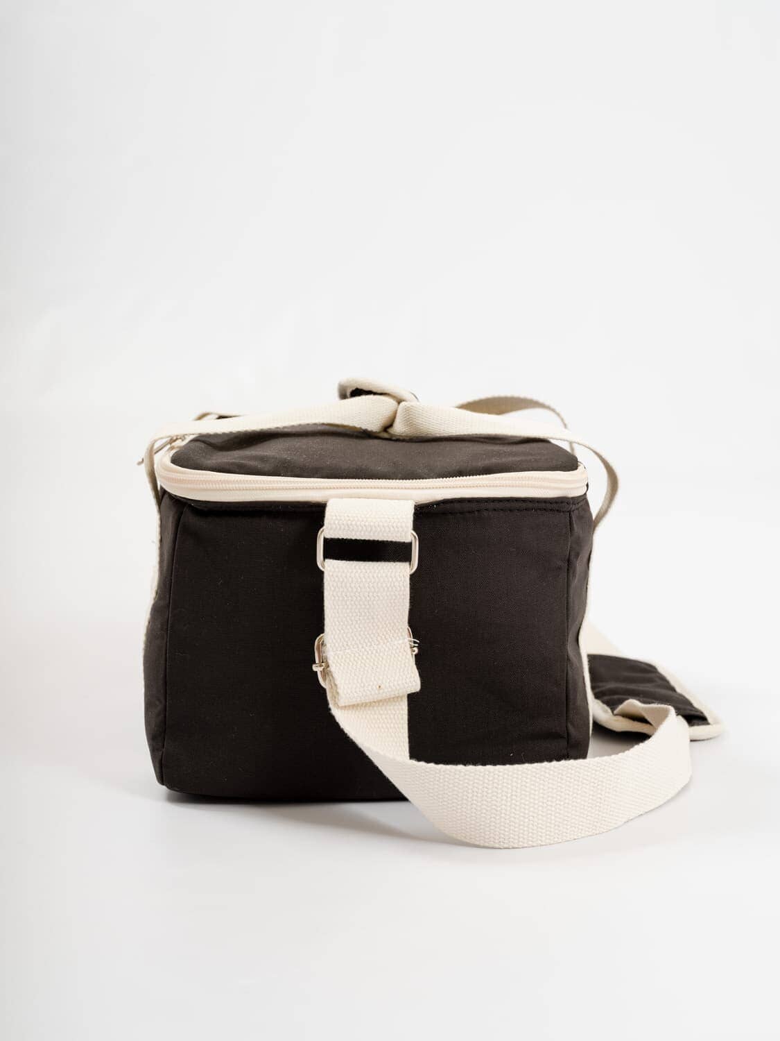 studio image of side of vintage black holiday cooler bag