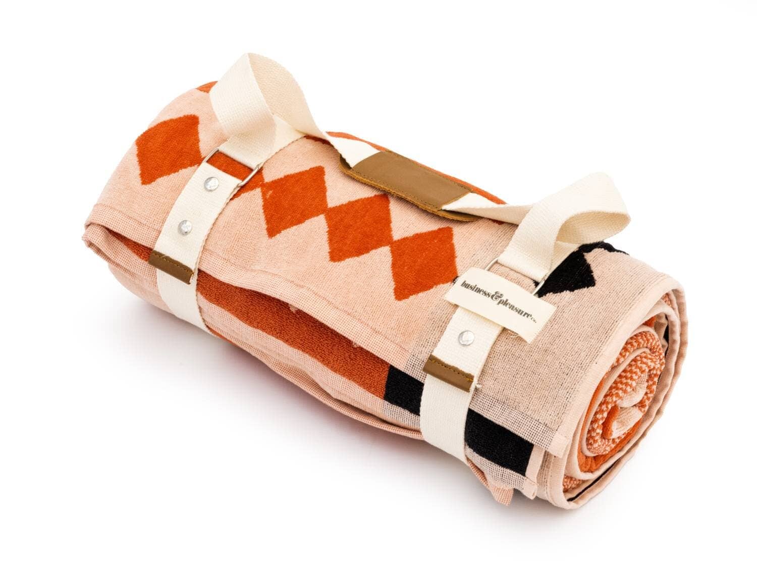 studio image of the diamond pink blanket rolled up