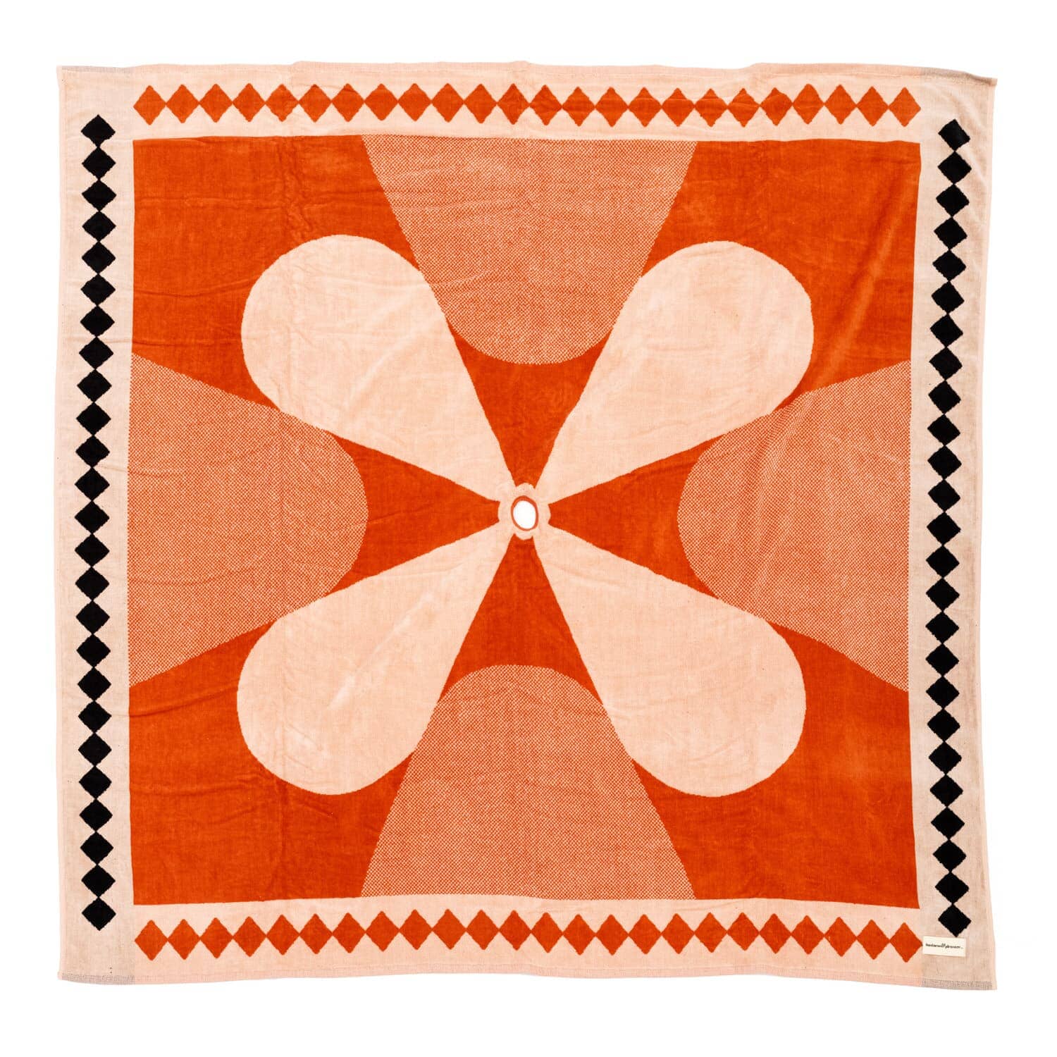 studio image of the diamond pink blanket laying flat