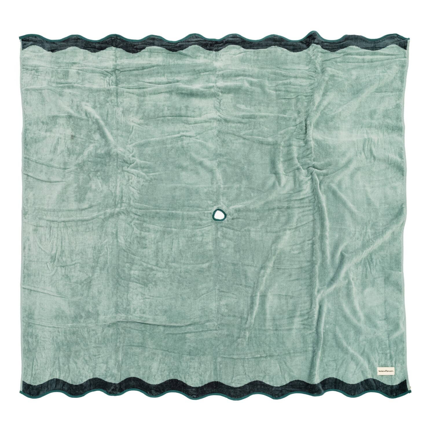 Studio image of Riviera green beach blanket