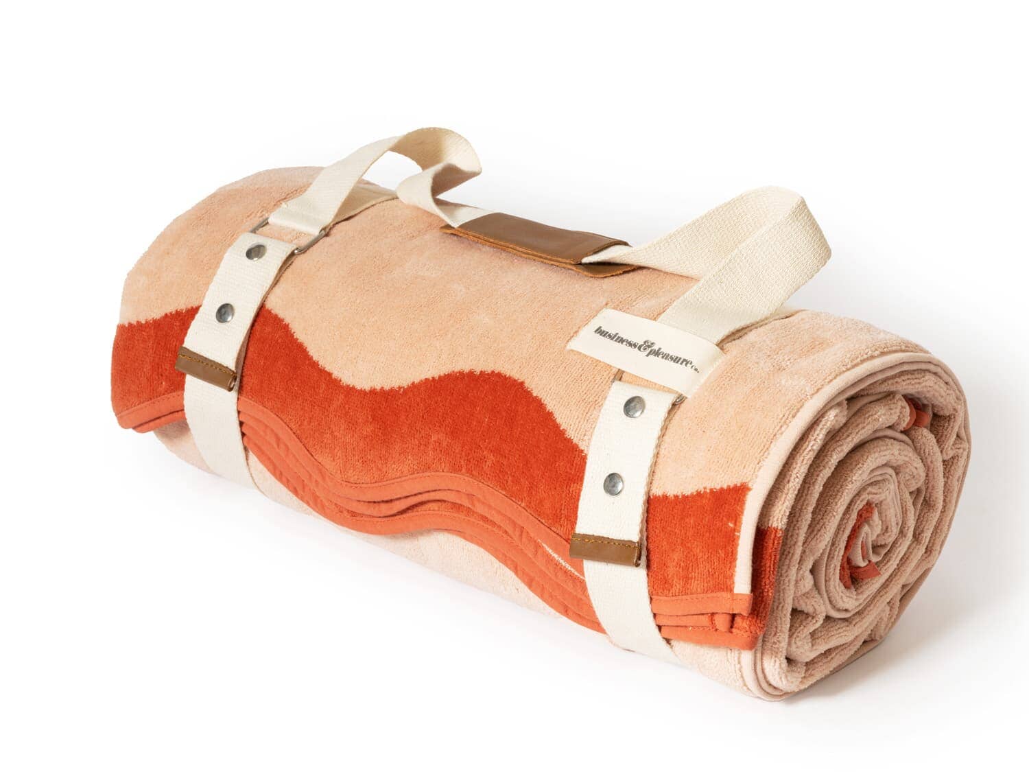 studio image of rolled up riviera pink beach blanket