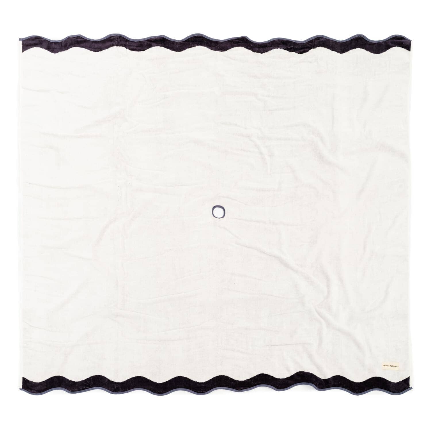 studio image of riviera white beach blanket laying flat