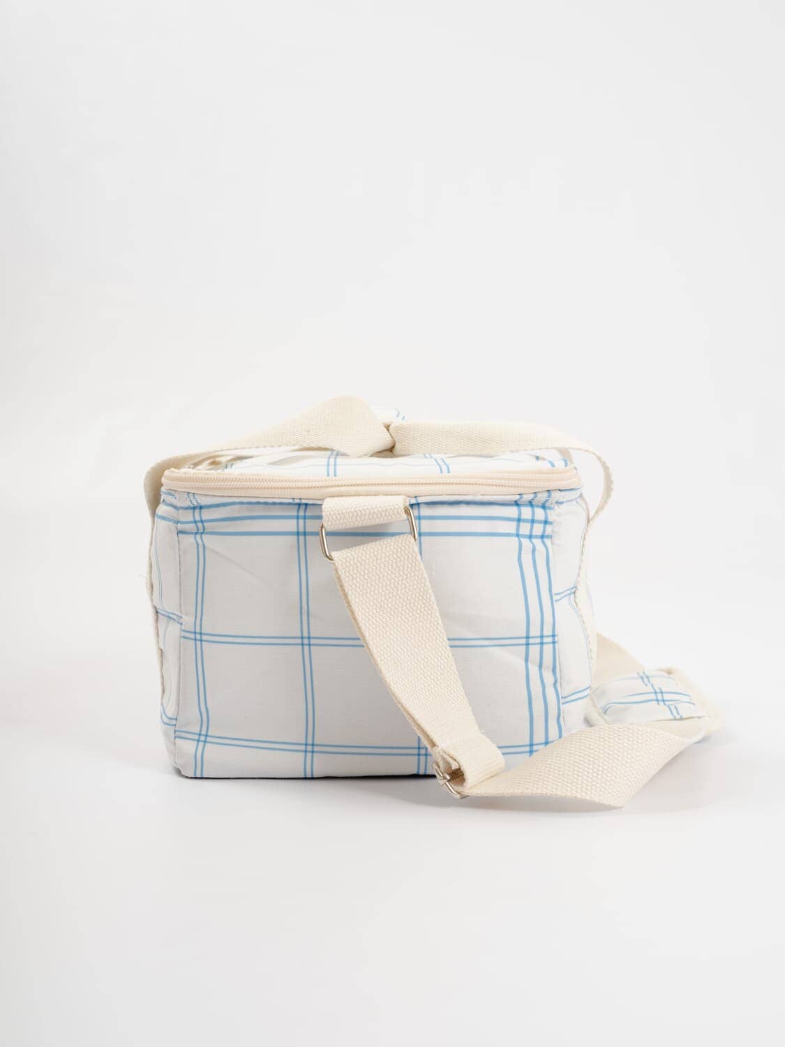 studio image of side of blue plaid holiday cooler
