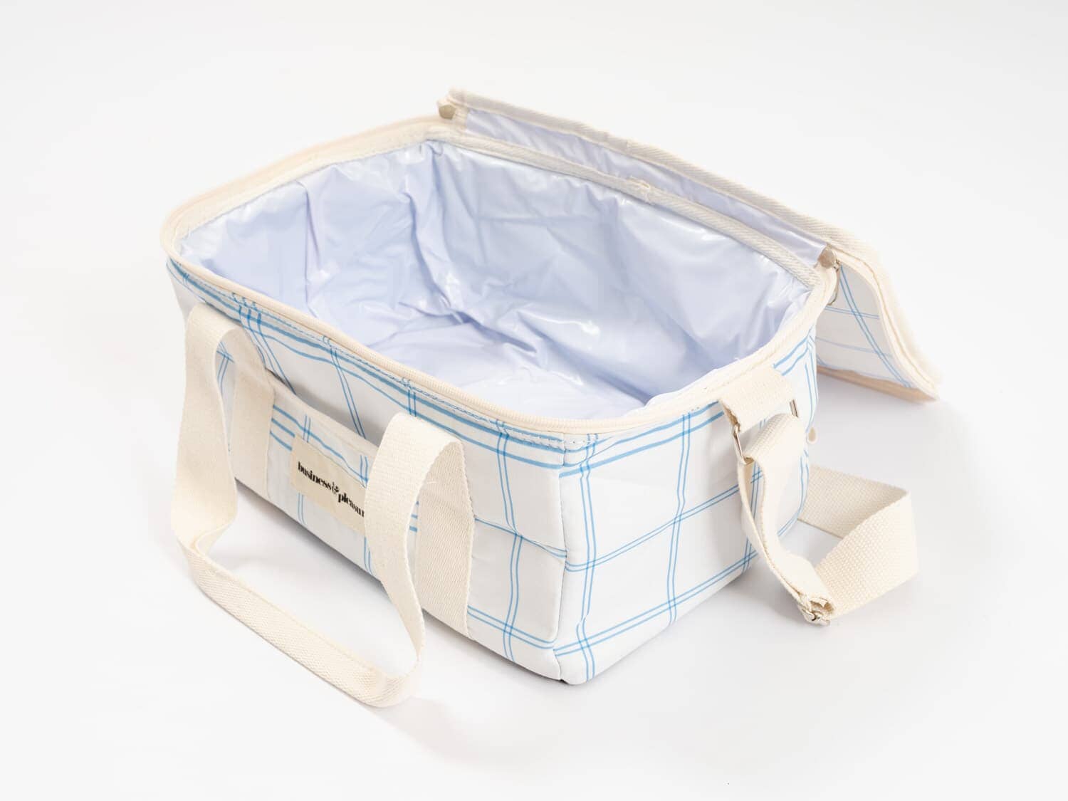 studio image of blue plaid holiday cooler interior