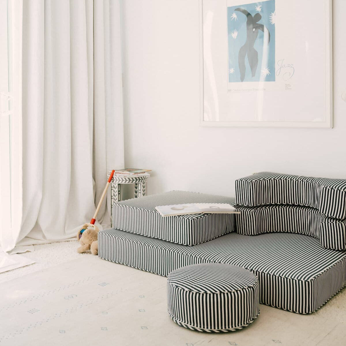 Lifestyle image of a child's room with the modular pillow stack arranged