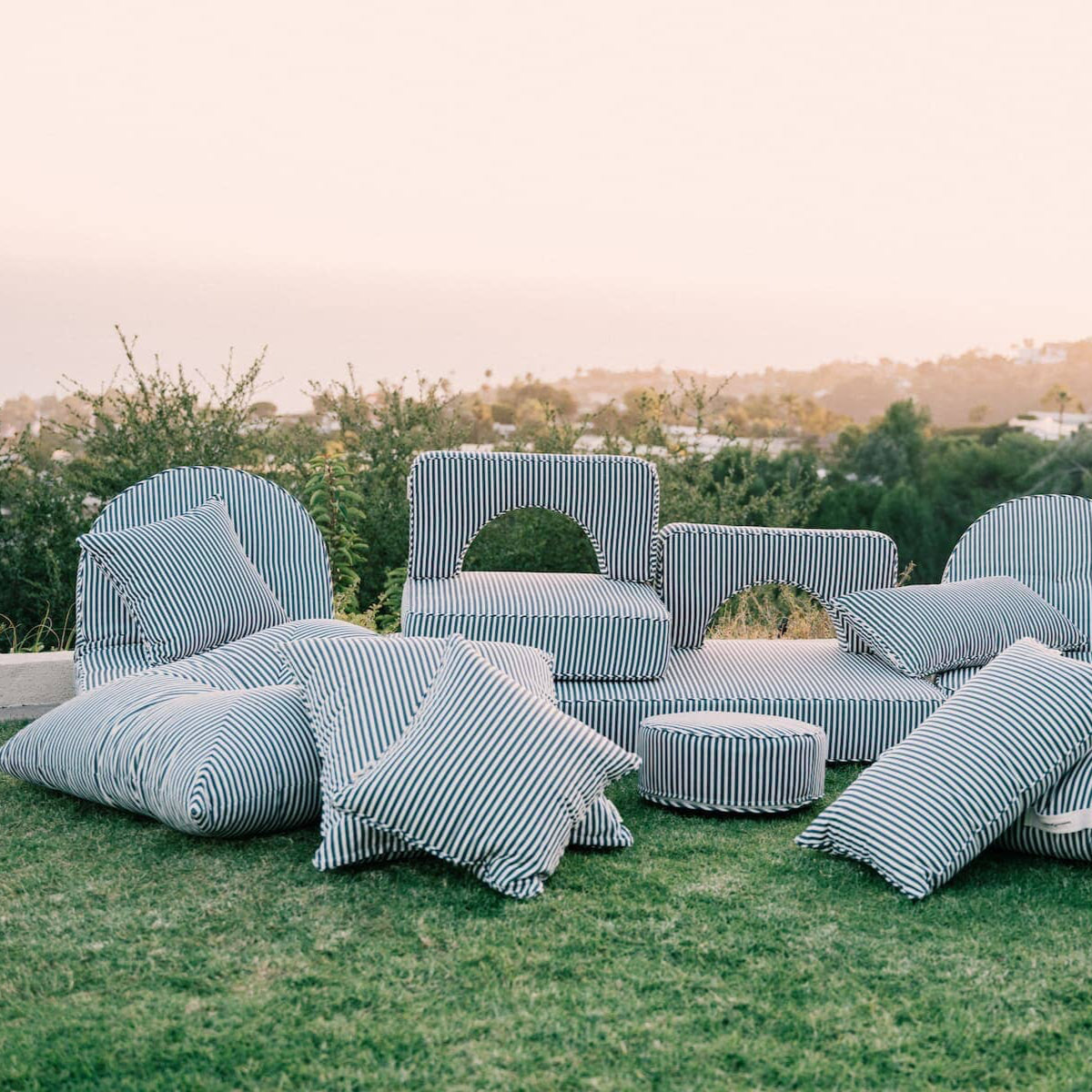 complete outdoor cushion collection on the grass