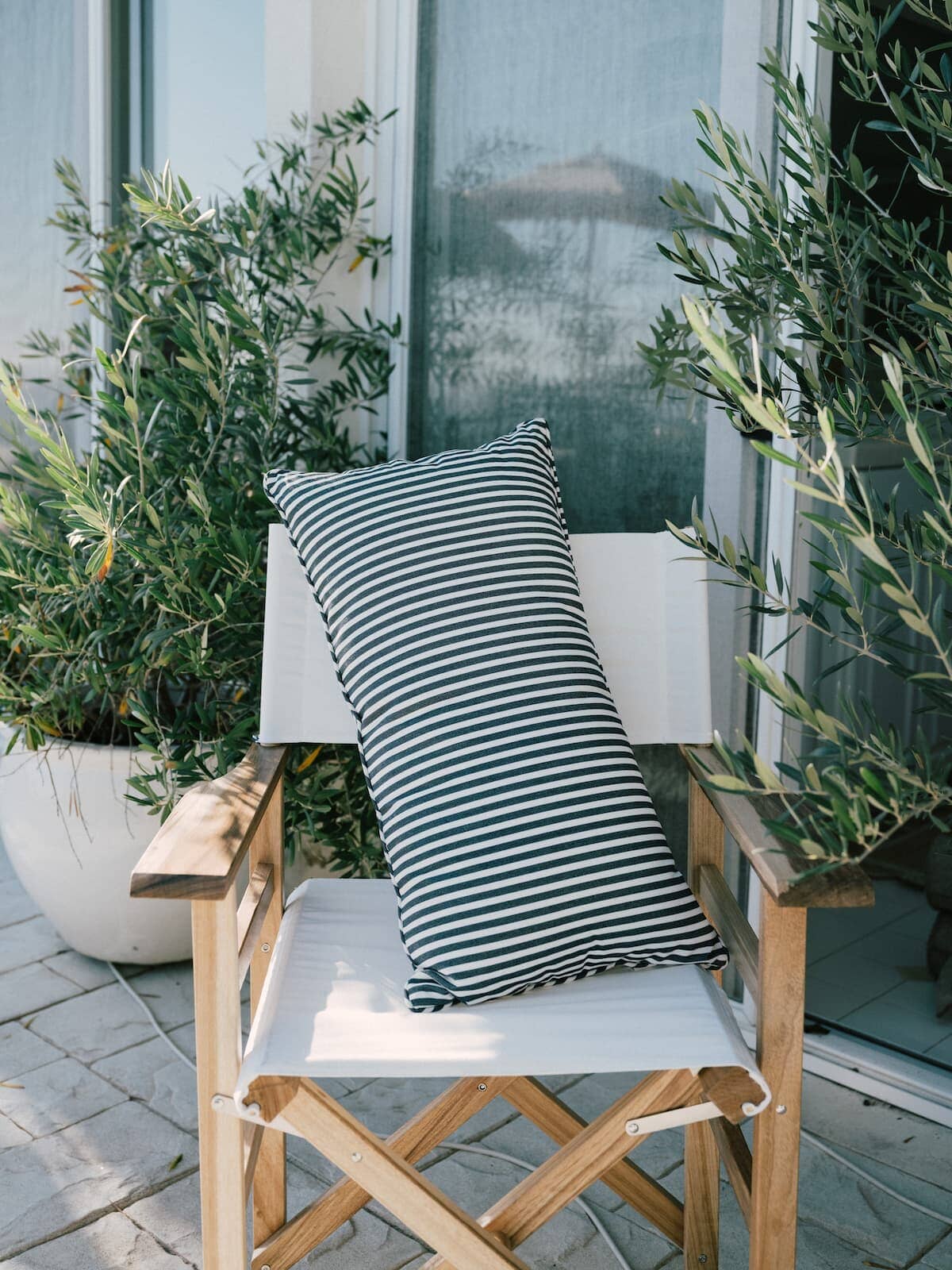 image of rectangle throw pillow on a directors chair