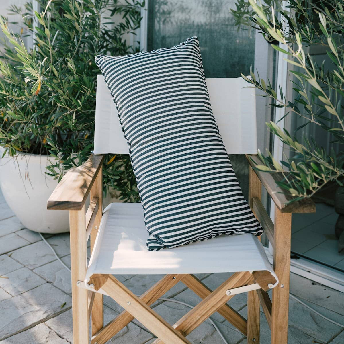 image of rectangle throw pillow on a directors chair