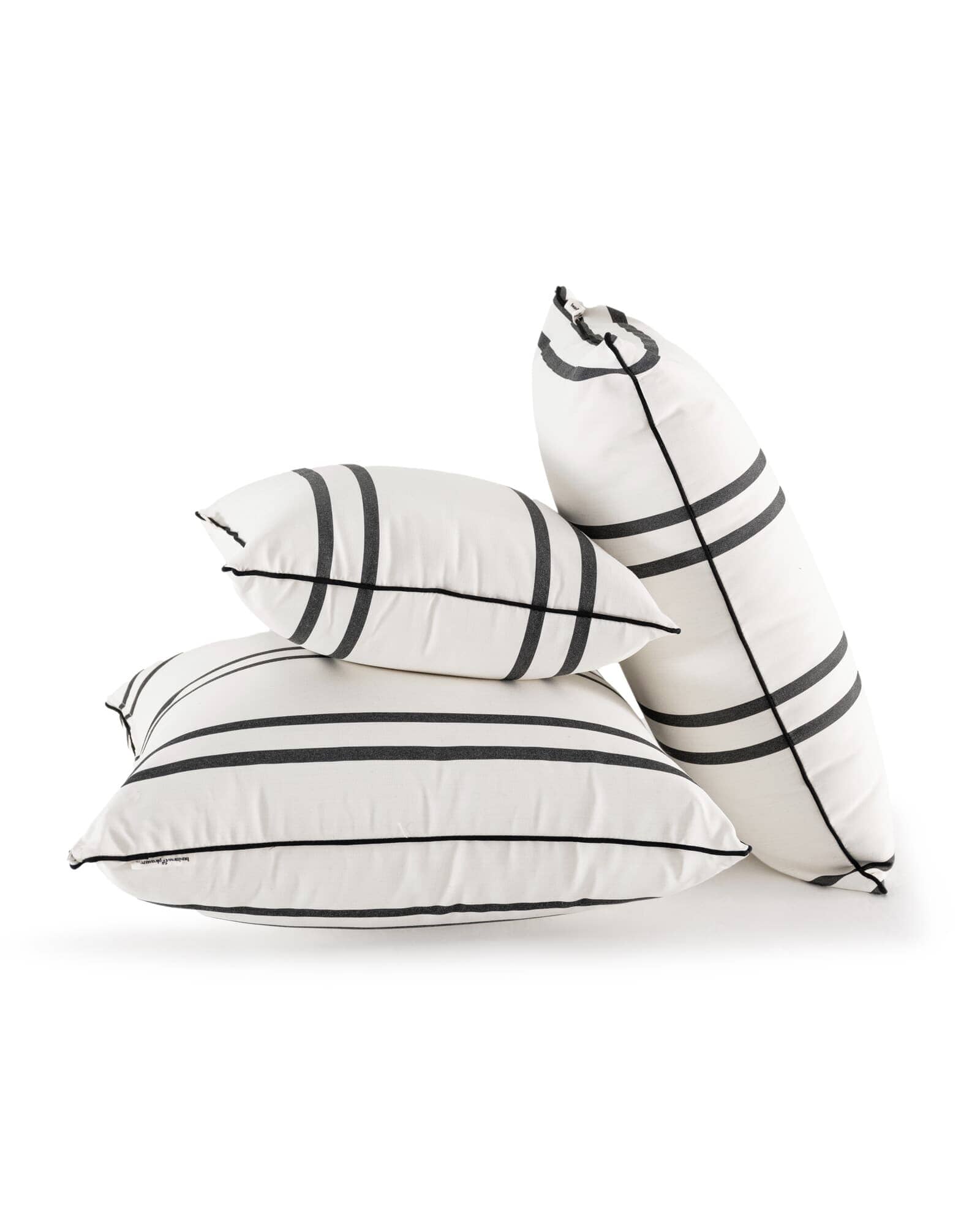 stack of malibu black stripe pillows